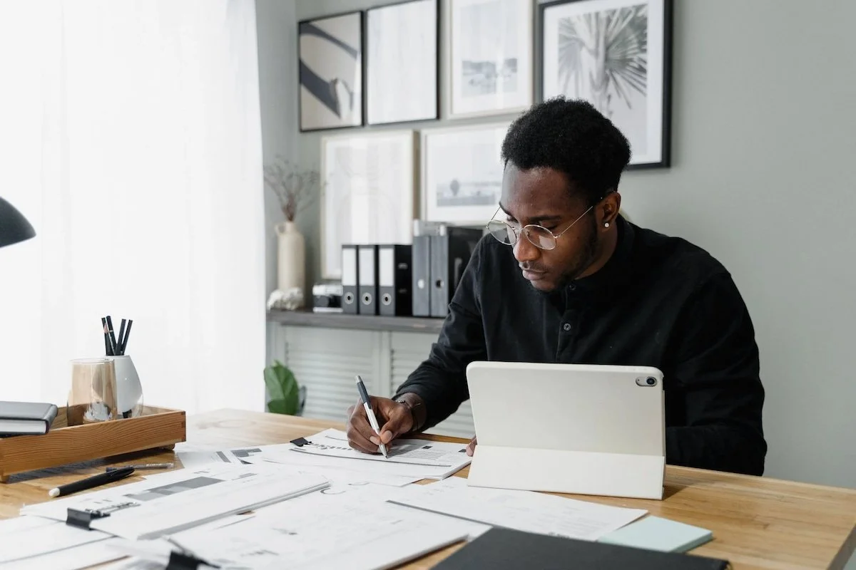 Image of a business professional at a desk.