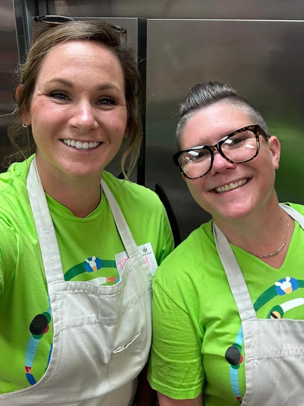 Voyage FCU team members Tiffany and Amber serving food at The Banquet in Sioux Falls, SD
