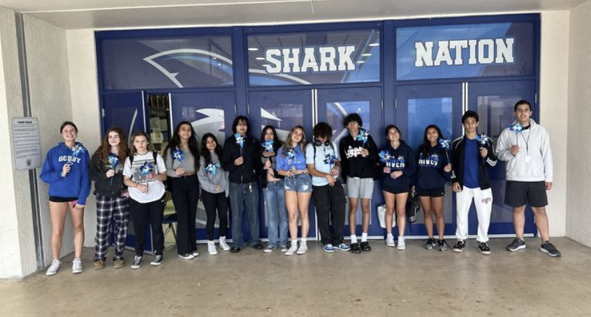 Spanish River Sharks Take a Stand for Child Abuse Prevention with Pinwheel Garden