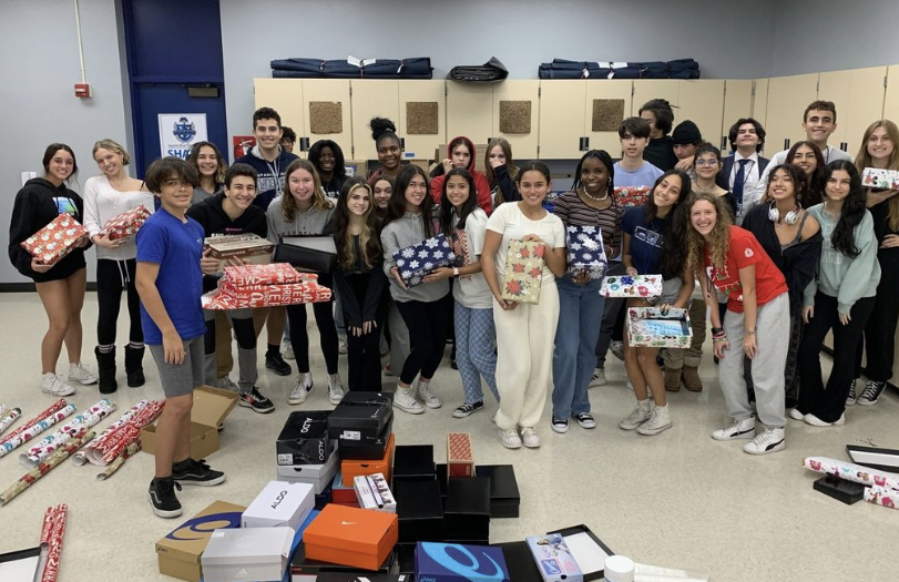 Hot Cocoa, Plushies, and Holiday Magic: Spanish River Sharks Deliver Festive Gift Boxes