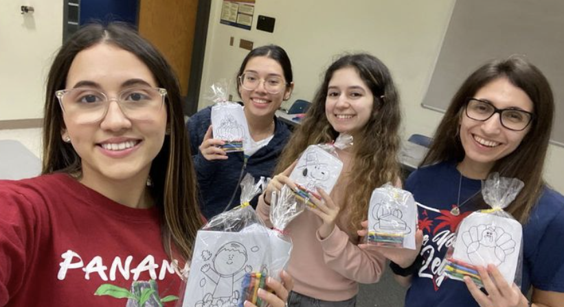 FAU Owls Brighten Kids' Days with Coloring Book Kits