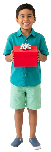 Young boy smiling and holding a red gift box with a silver bow.