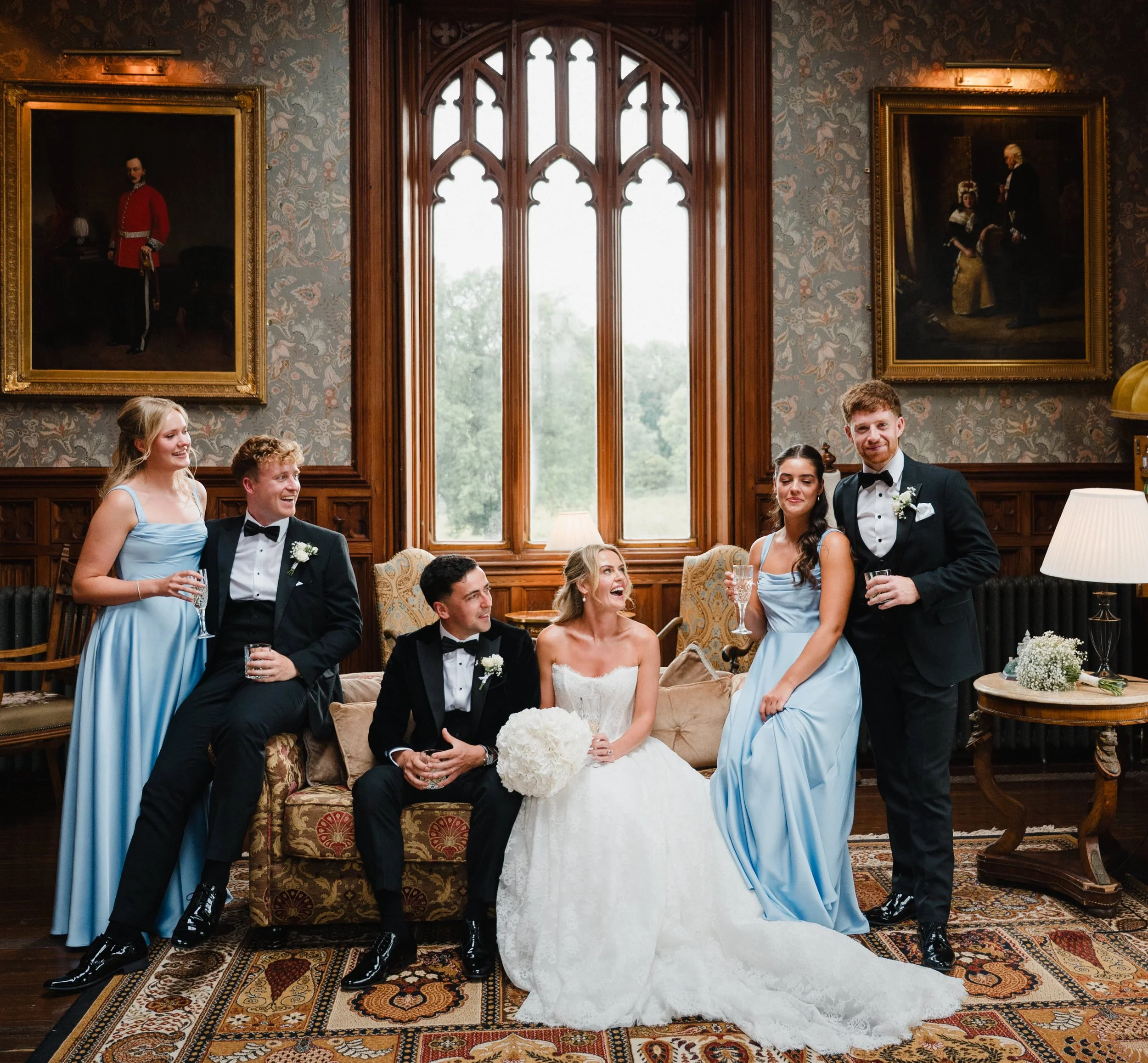 Lizzie &amp; Benny🤍 chilling with their bridal party before dinner entrance @markreecastlesligo 
.
@elizabethrcorbett 
@keirasmyths 
@theflowershedsligo 
@avmedia.ie 
.
#bridalparty #weddinginspiration #irishcastlewedding #sligoweddingphotographer