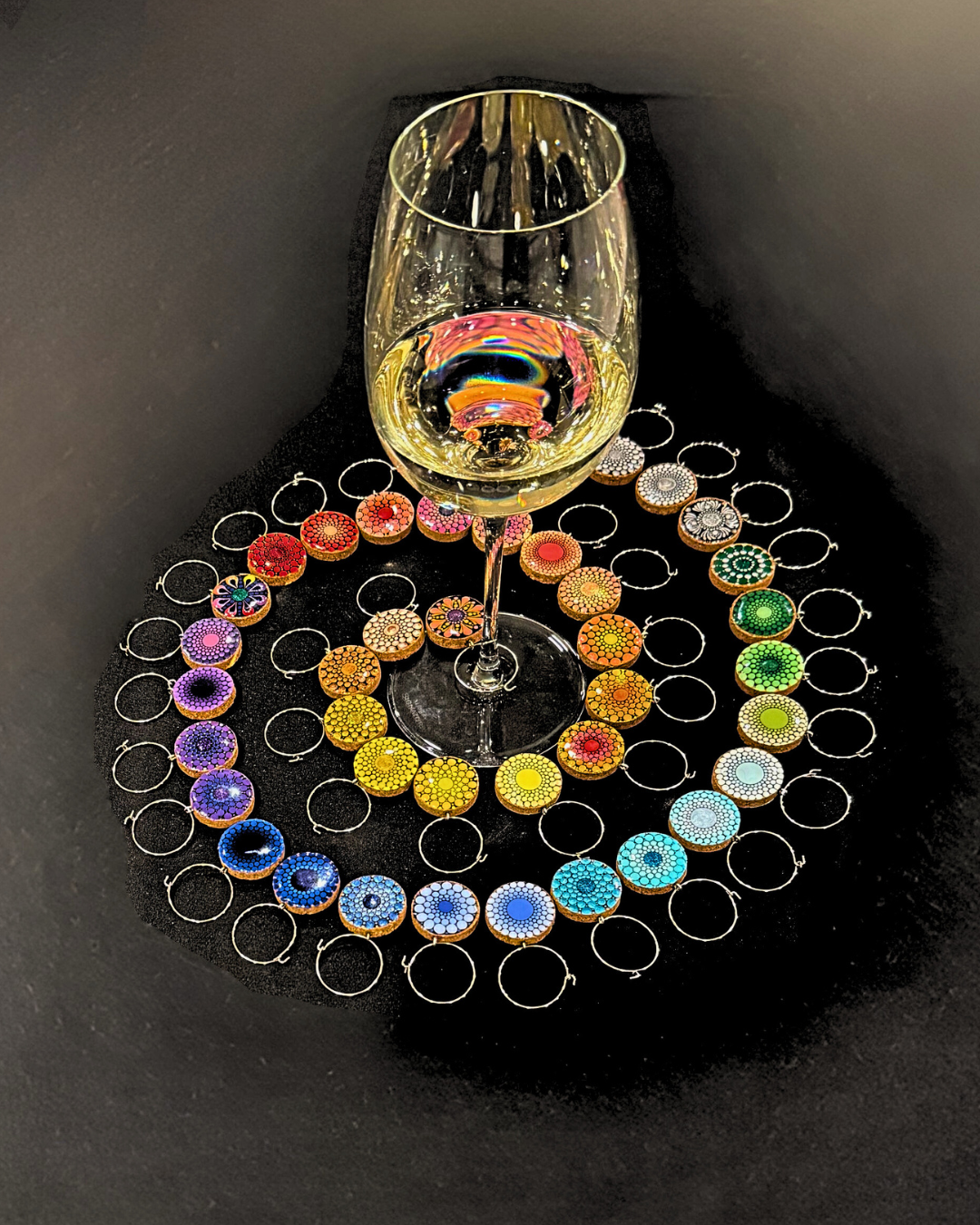 wineglasscharmspiralnologo.png