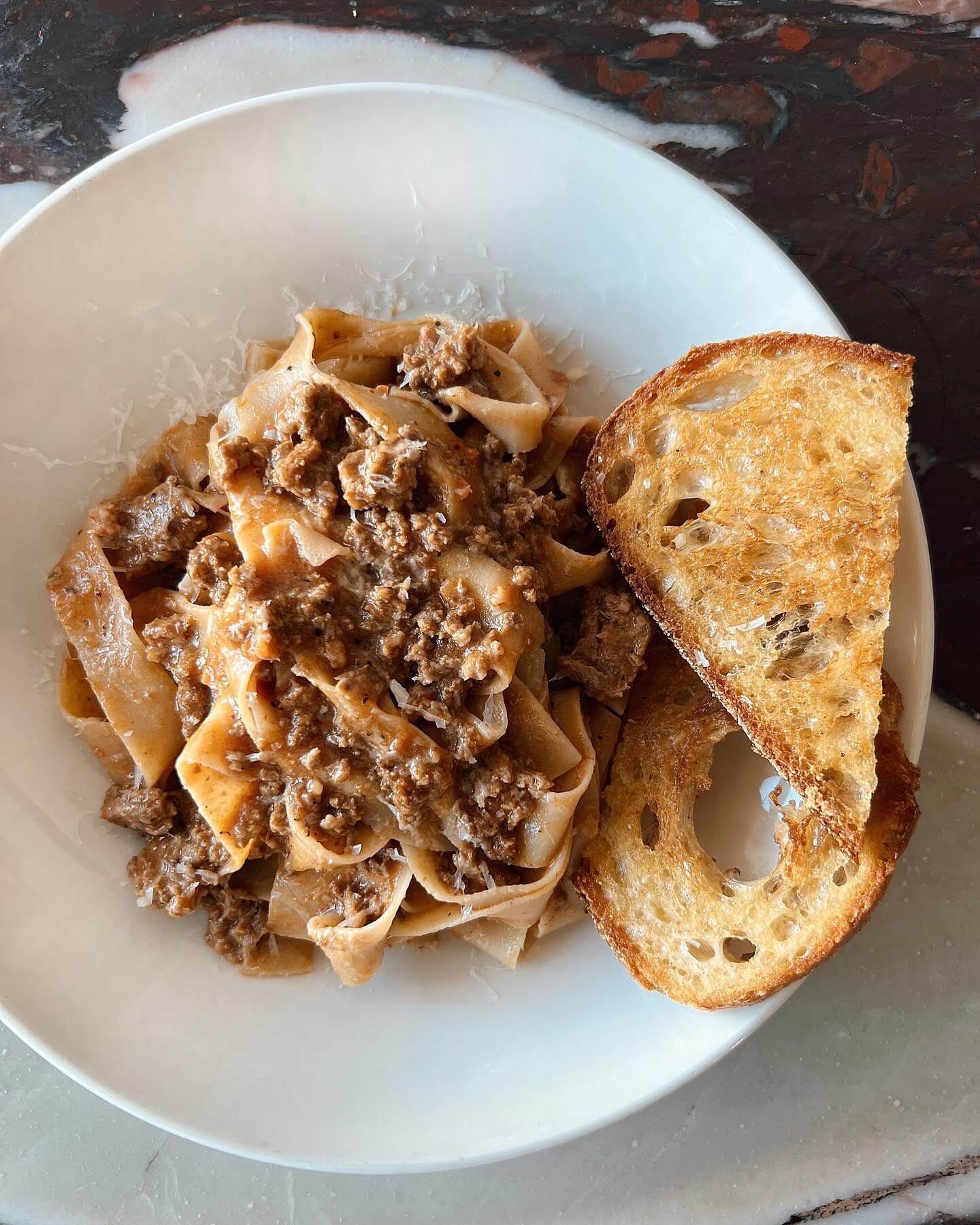 Our definition of comfort food! &ldquo;Bolognese&rdquo; with Carlson Farms Sausage, Certified Angus Beef, 18 month Pecorino &amp; Pappardelle from West Michigan Pasta Provisions &amp; Sarkozy Sourdough Toast!