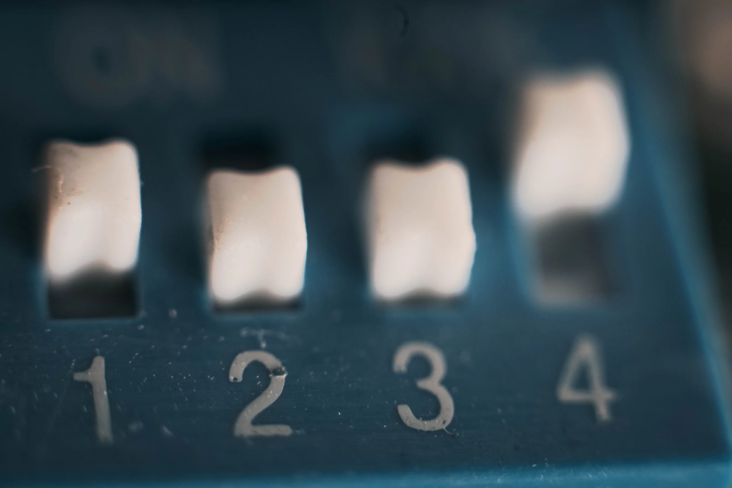 Macro shot of a four position switch from a computer board.