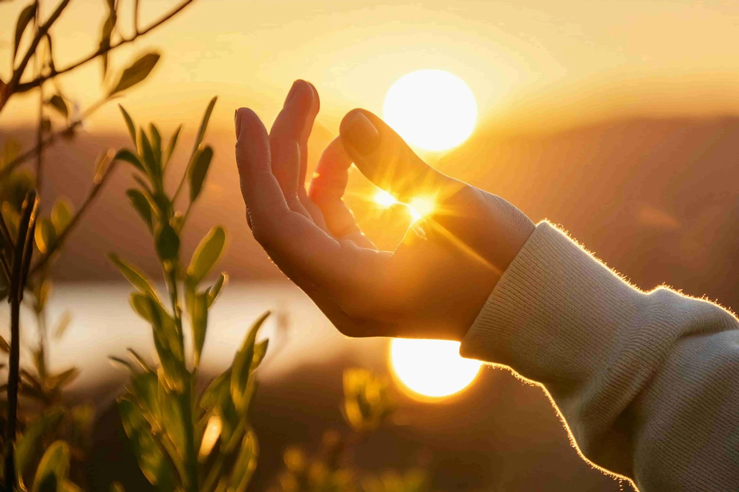 hand with light going through the fingers