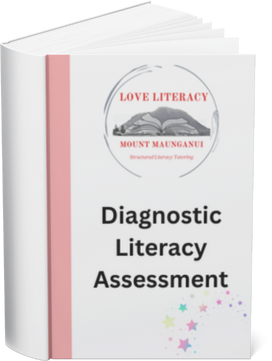 Cover of a book titled "Diagnostic Literacy Assessment" with a white background, pink spine, and a logo saying "Love Literacy Mount Maunganui" featuring a whale illustration.