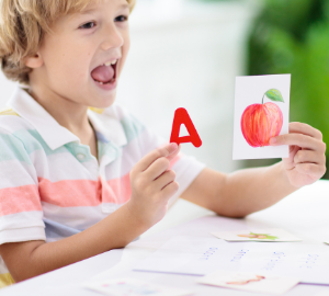 Children learning to read through Structured Literacy reinforcing phonics patterns