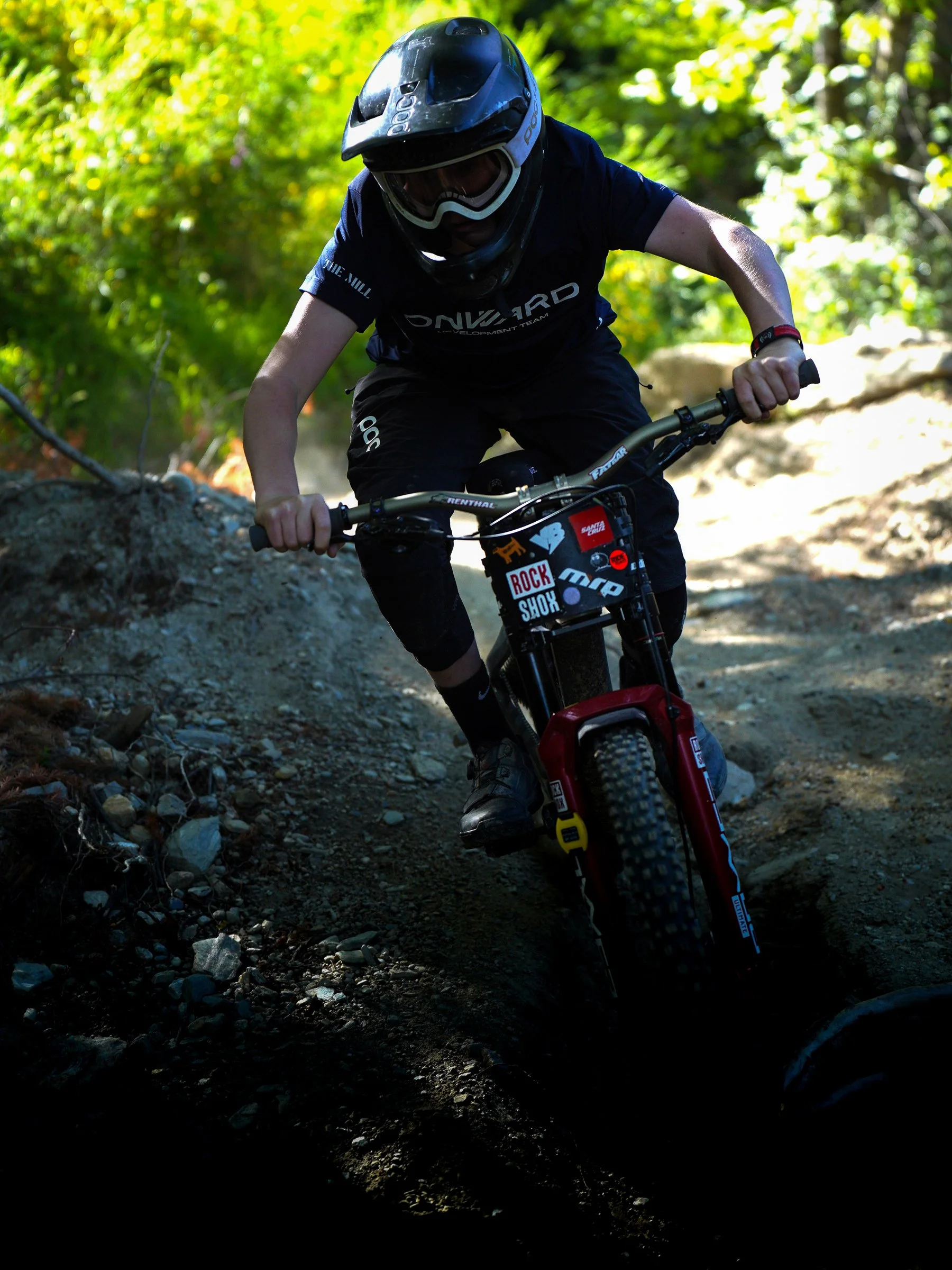 Expert junior mountain bike rider receiving skills coaching from Onward MTB in Queenstown
