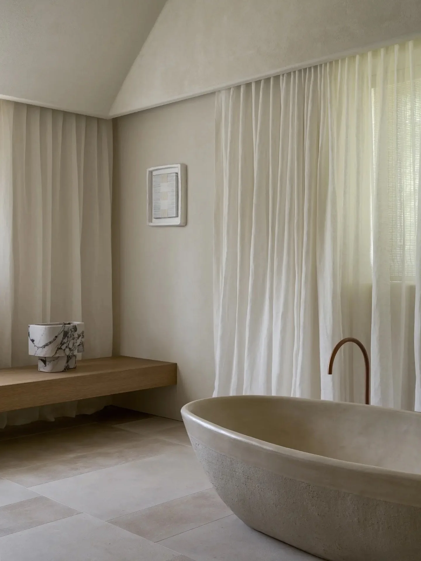 There&rsquo;s an undeniable elegance in the tactile materiality of this home: the way every texture comes together, not competing but complementing one another.

The same idea flows through every space, from the bathrooms to the living area. Nothing 