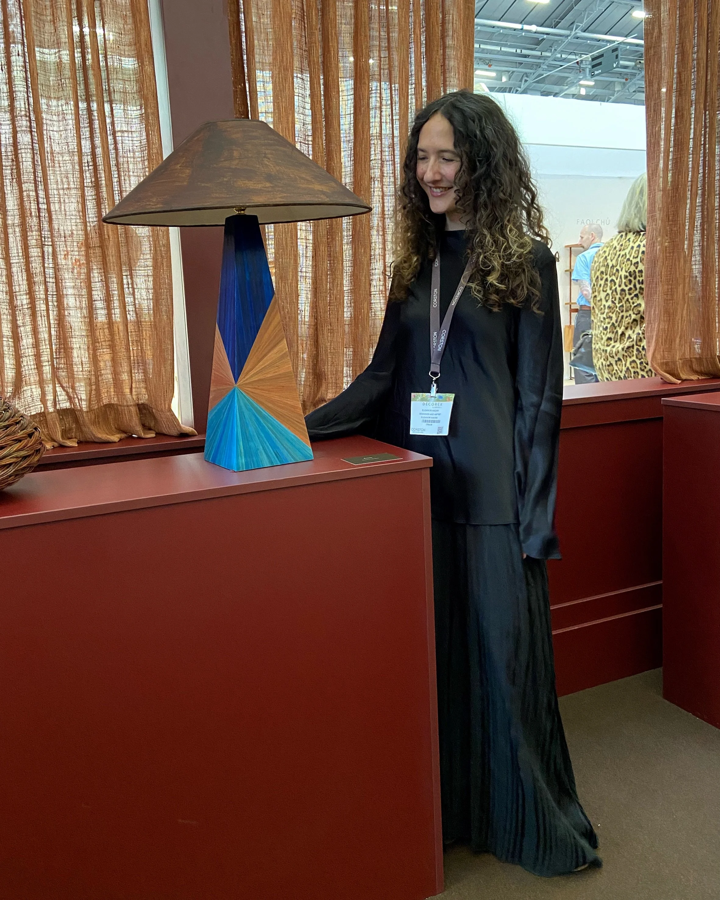A lovely morning at @decorex_international yesterday, seeing my straw marquetry lamps on display.

The lamps are part of A Seat at the Table, an installation by @aevencollective bringing together makers and craftspeople from across the UK.

Such a wo