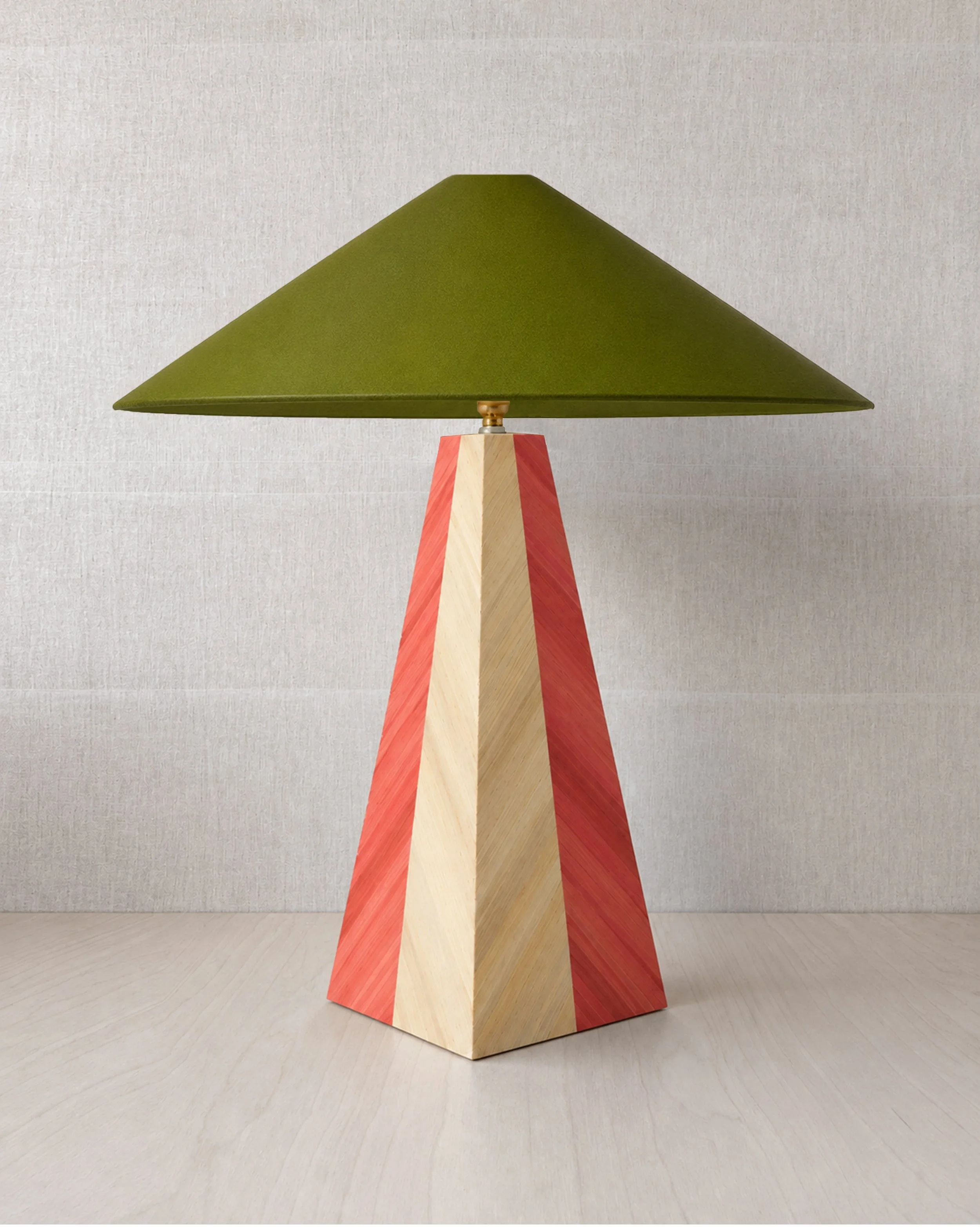 Block Stripe pyramid table lamp by Eleanor Nadimi, featuring coral pink and natural straw marquetry stripes with a green conical lampshade.