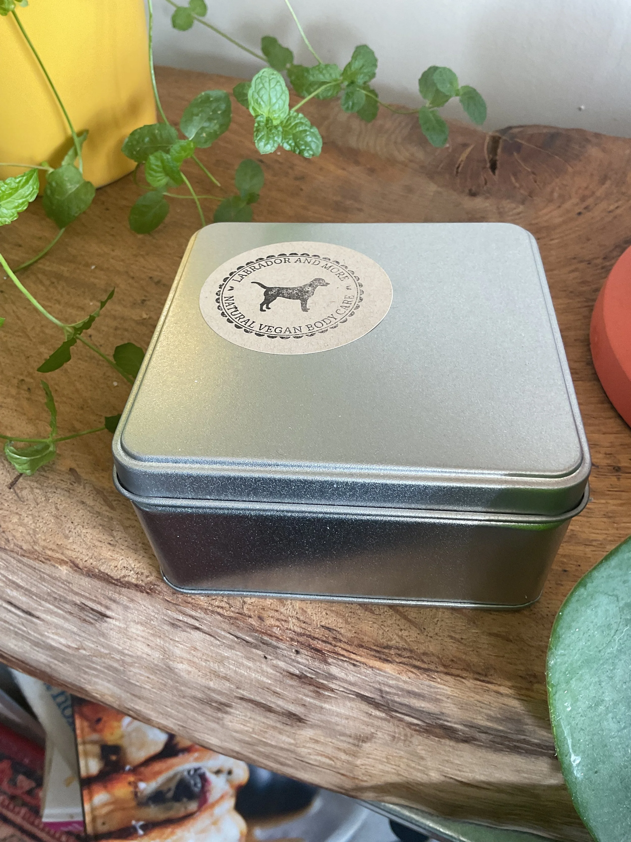 tin of mini soaps with lid on