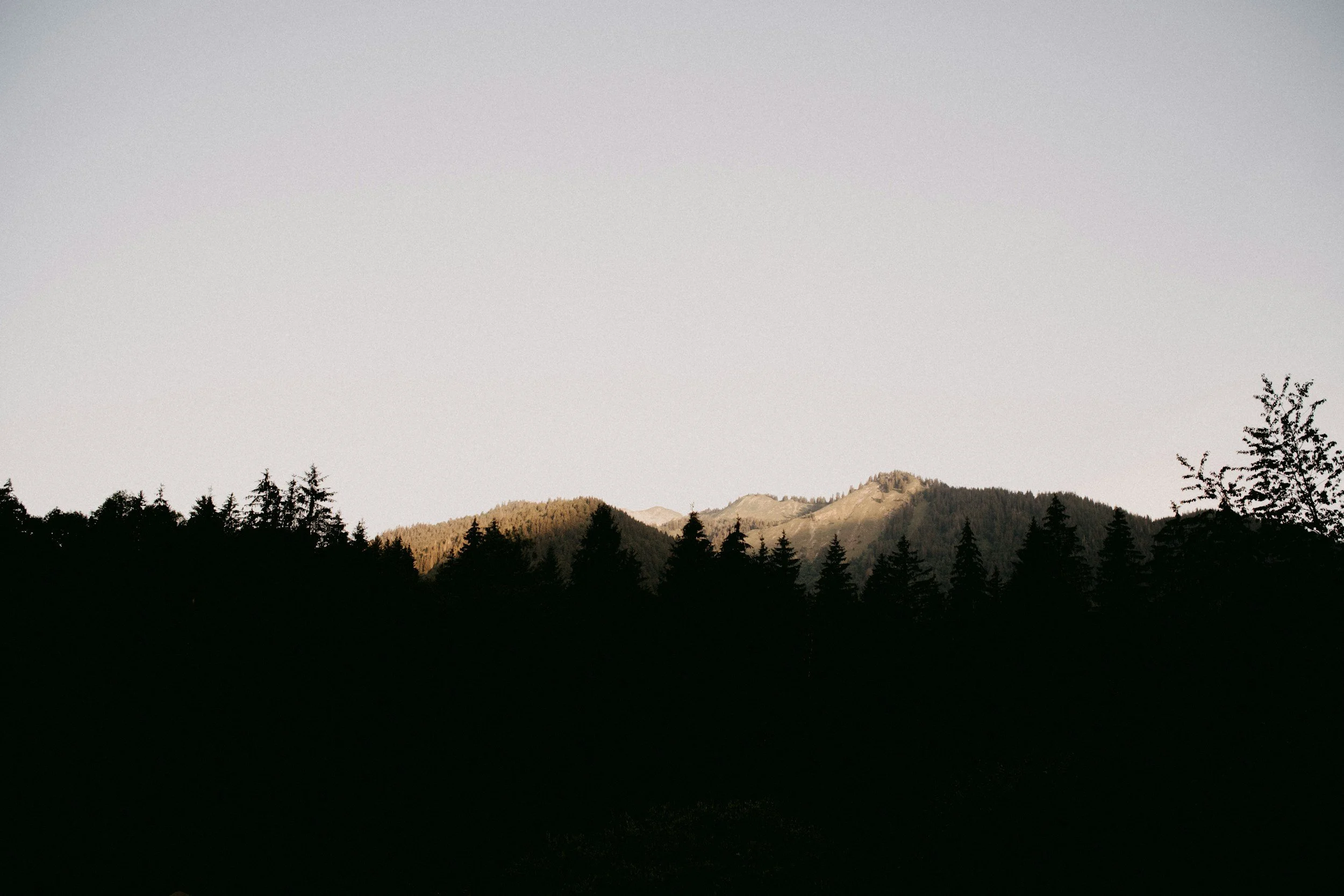 Grey sky and mountain landscape background for The Law Leaders Syndicate™ elite mastermind section.