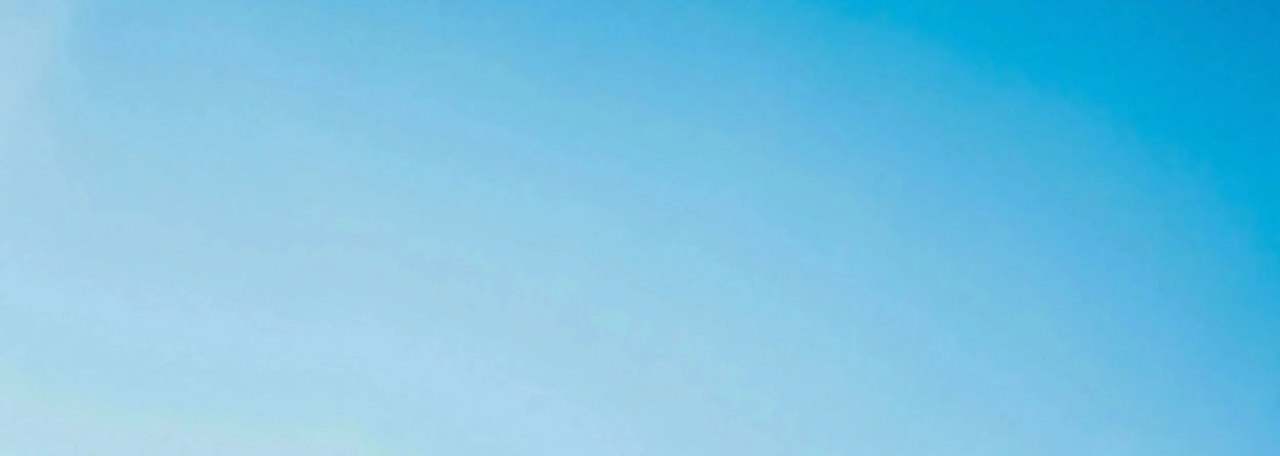 Clear blue sky background for the John R. Kormanik leadership coaching consultation section