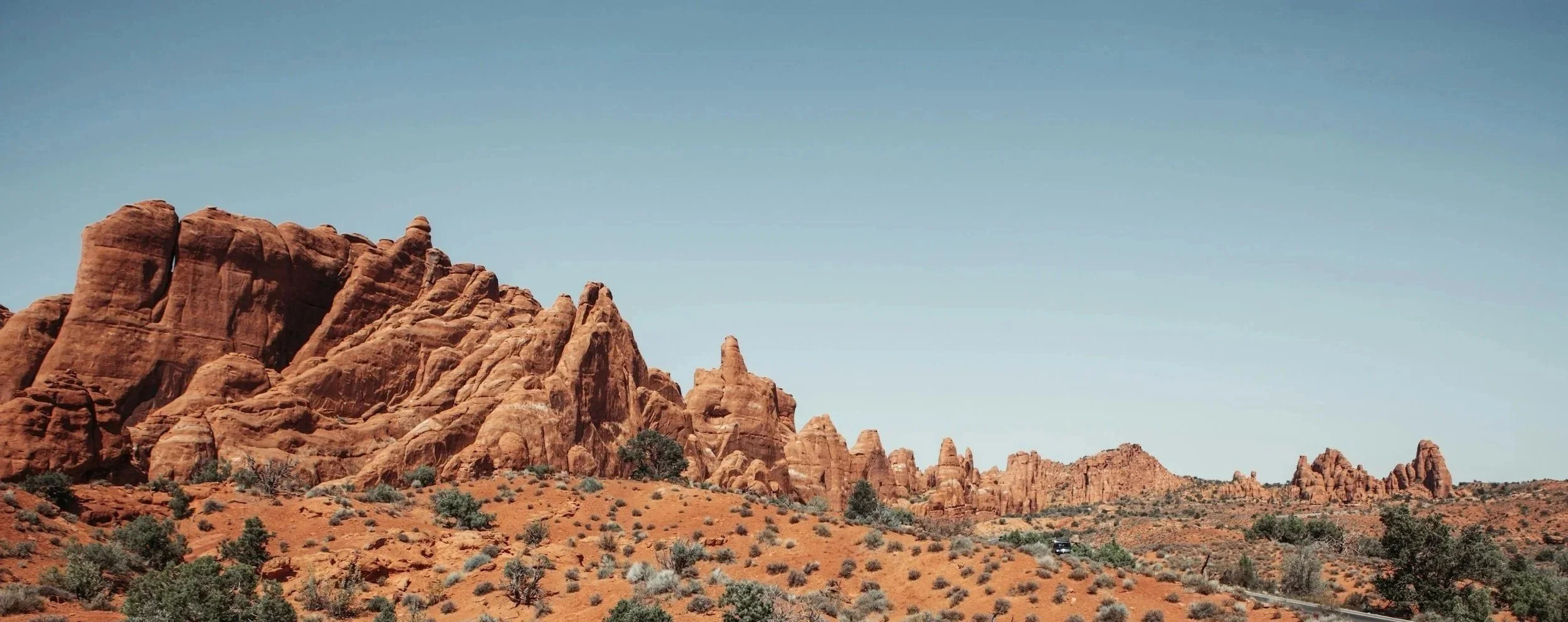 Desert mountain landscape representing the perspective and clarity found in a private, exclusive 1:1 coaching partnership with John R. Kormanik.