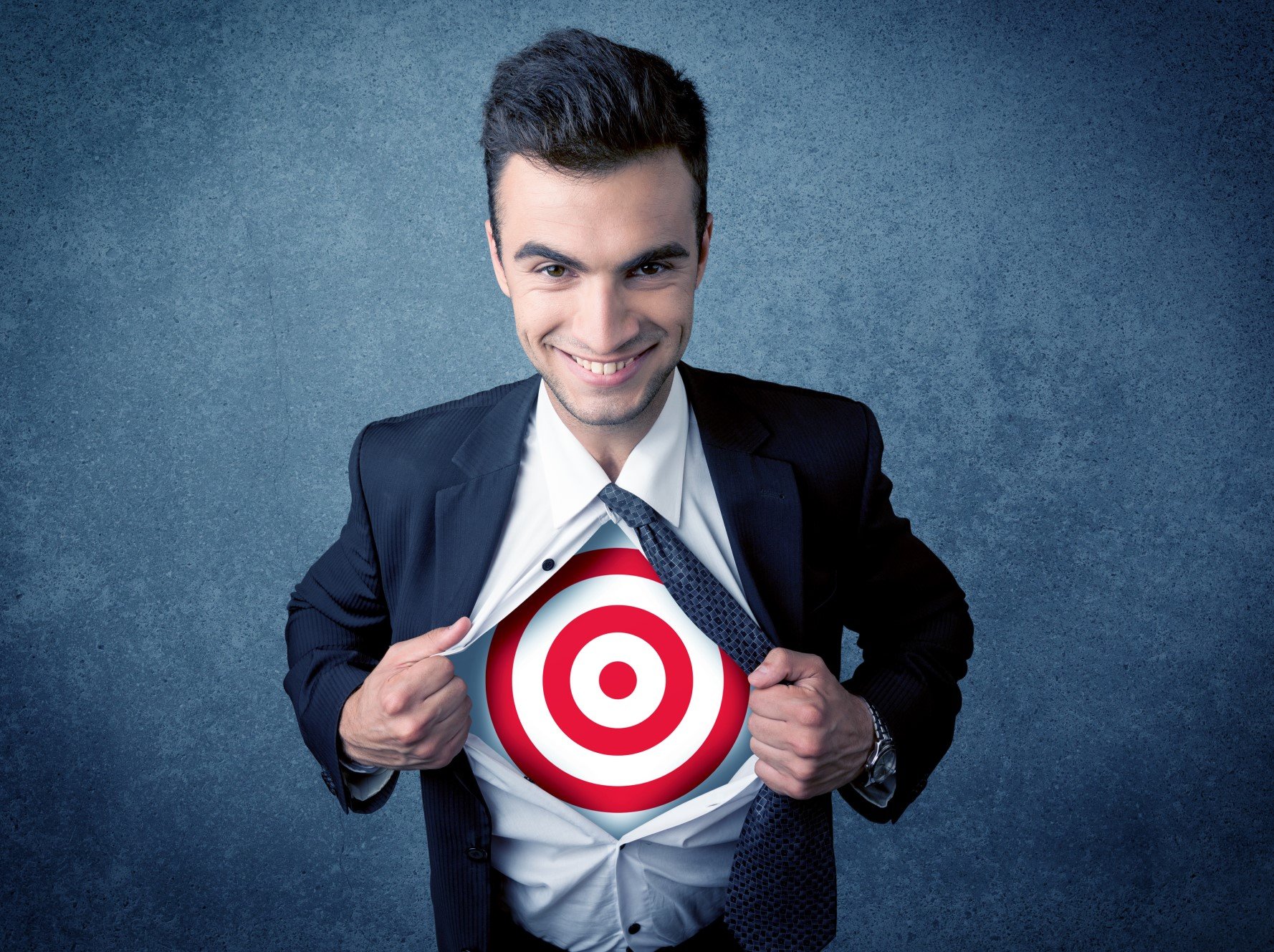 A businessman with a target on his chest, representing an ideal customer profile or ICP