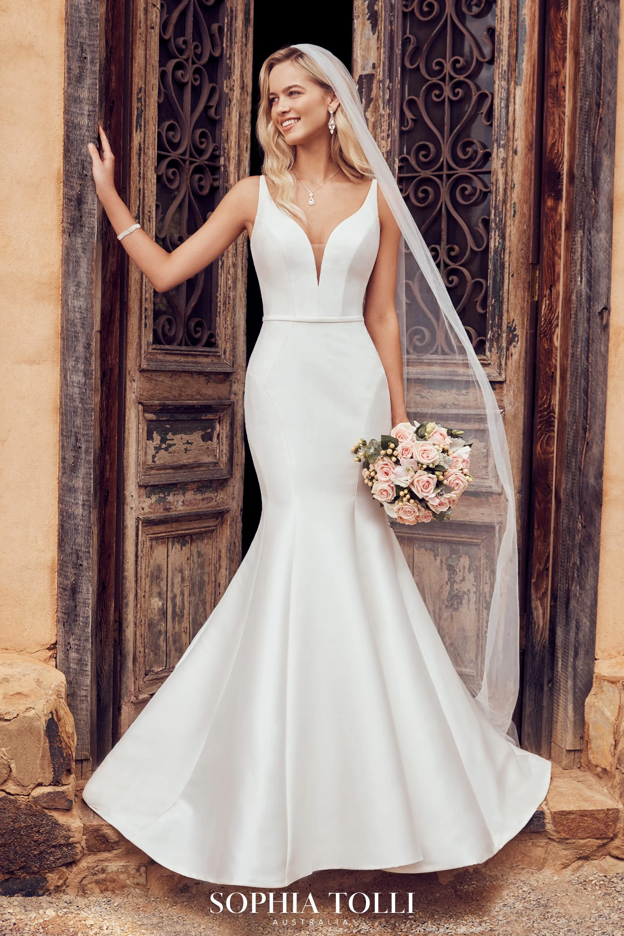 Alexis - Sophia Tolli, Size 12, $850
Ivory