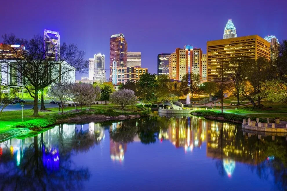 Illuminated Charlotte, NC, skyline, representing the home of Lakeview Building Group.