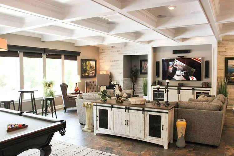 A custom home family room featuring intricate woodwork.