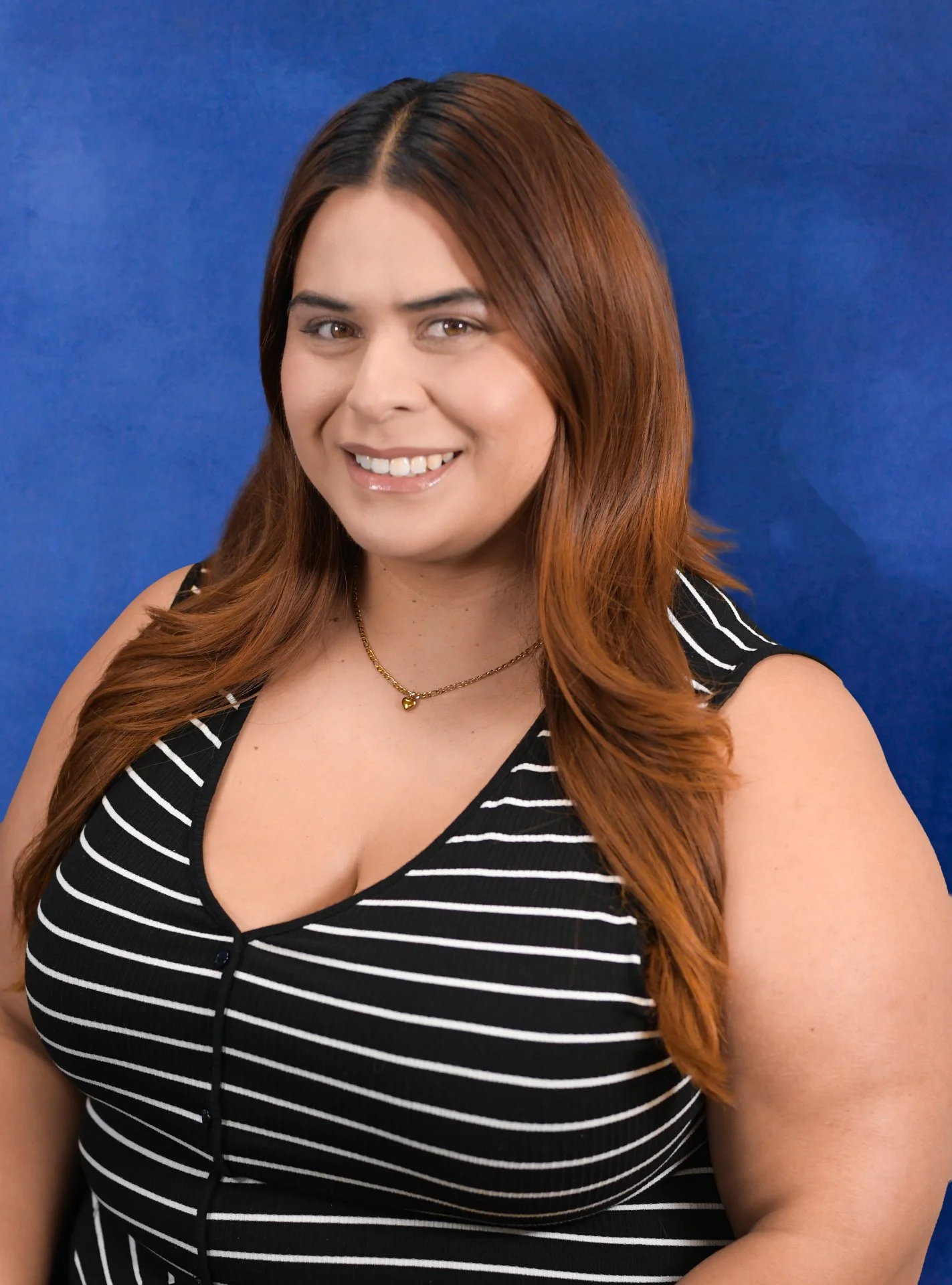 Woman with brown hair smiling