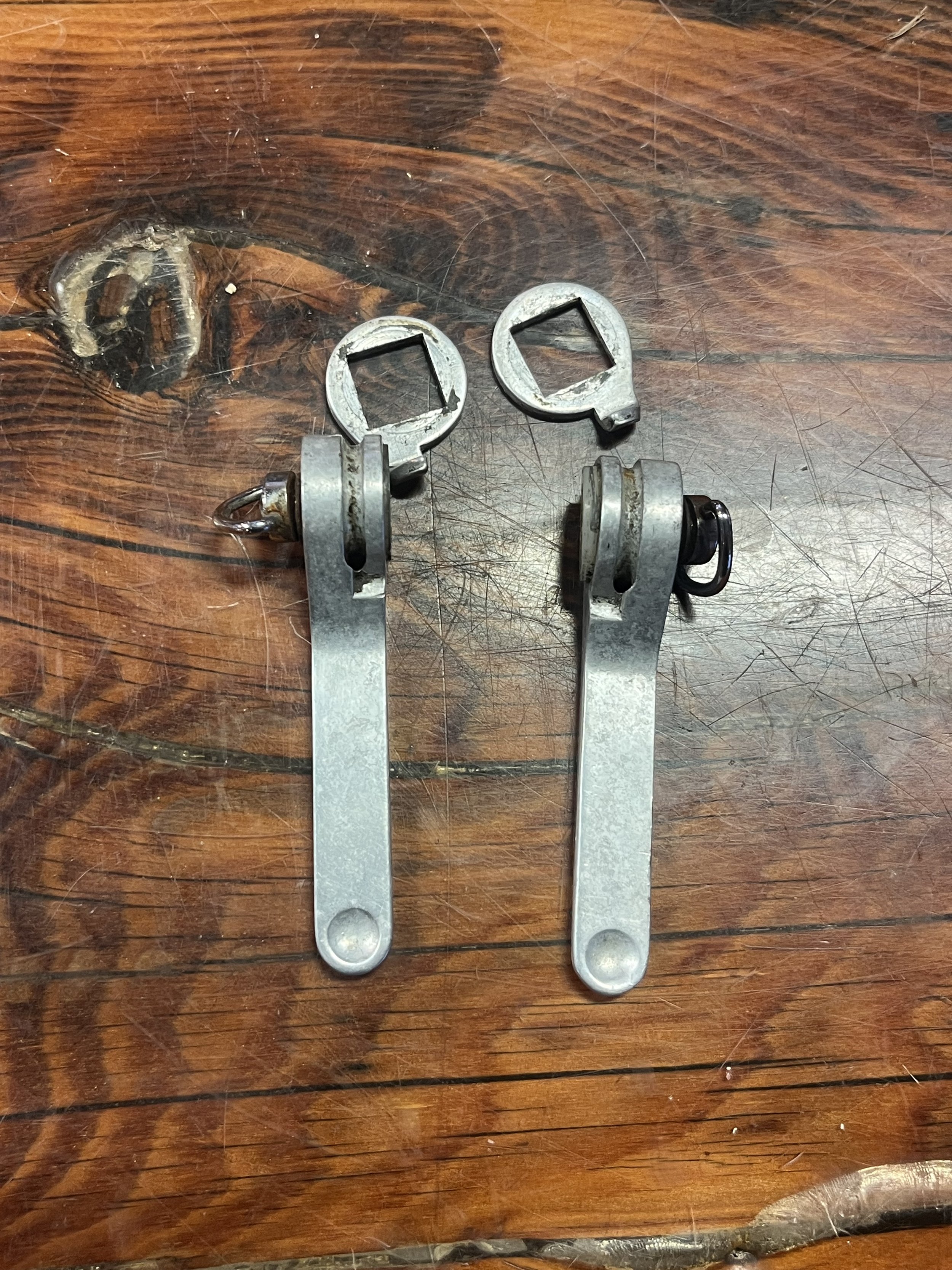 Photo of a vintage pair of Campagnolo Triomphe downtube shifters for sale.