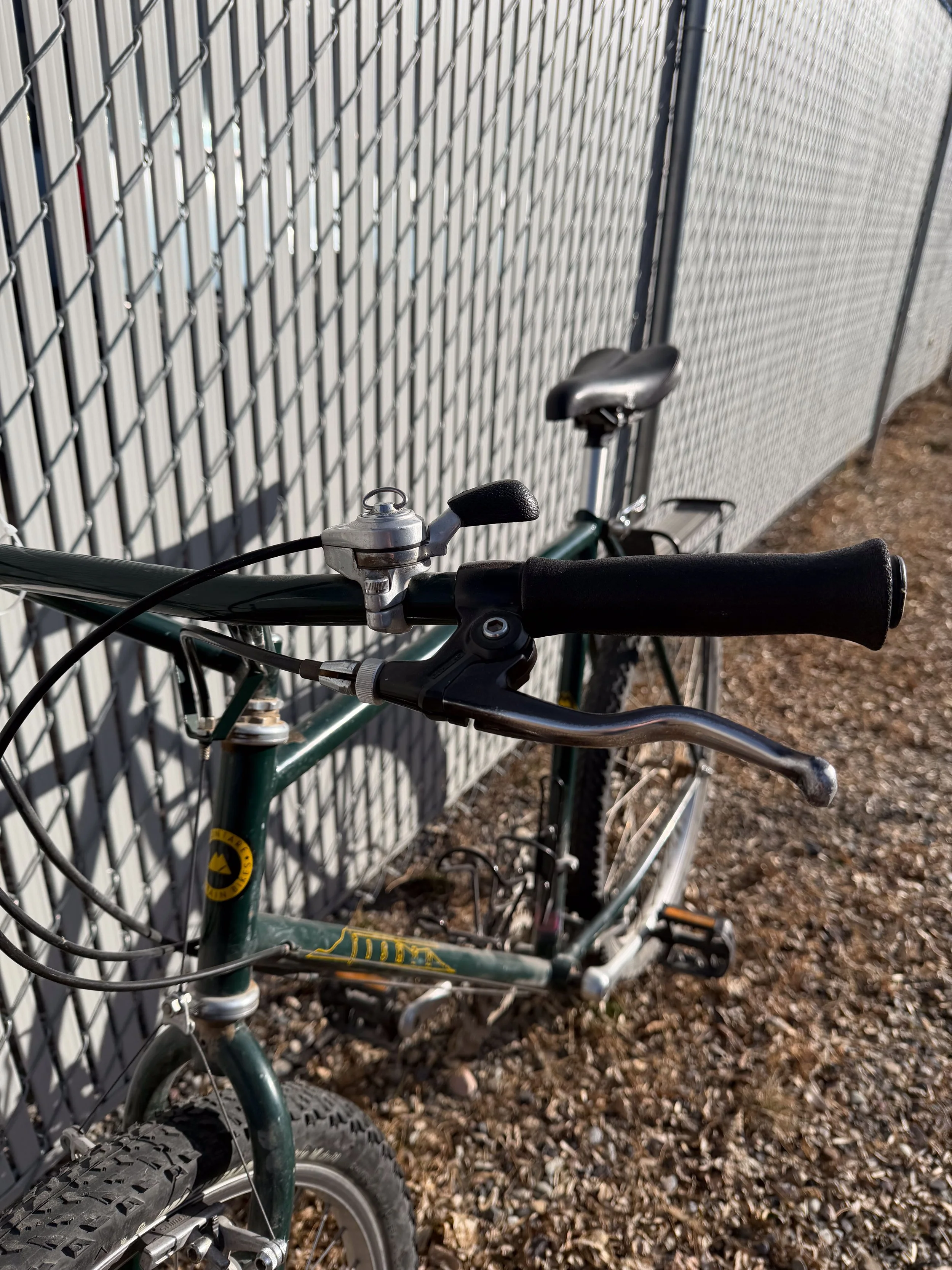 Photo of a 1985 vintage green Fisher mountain bike for sale.