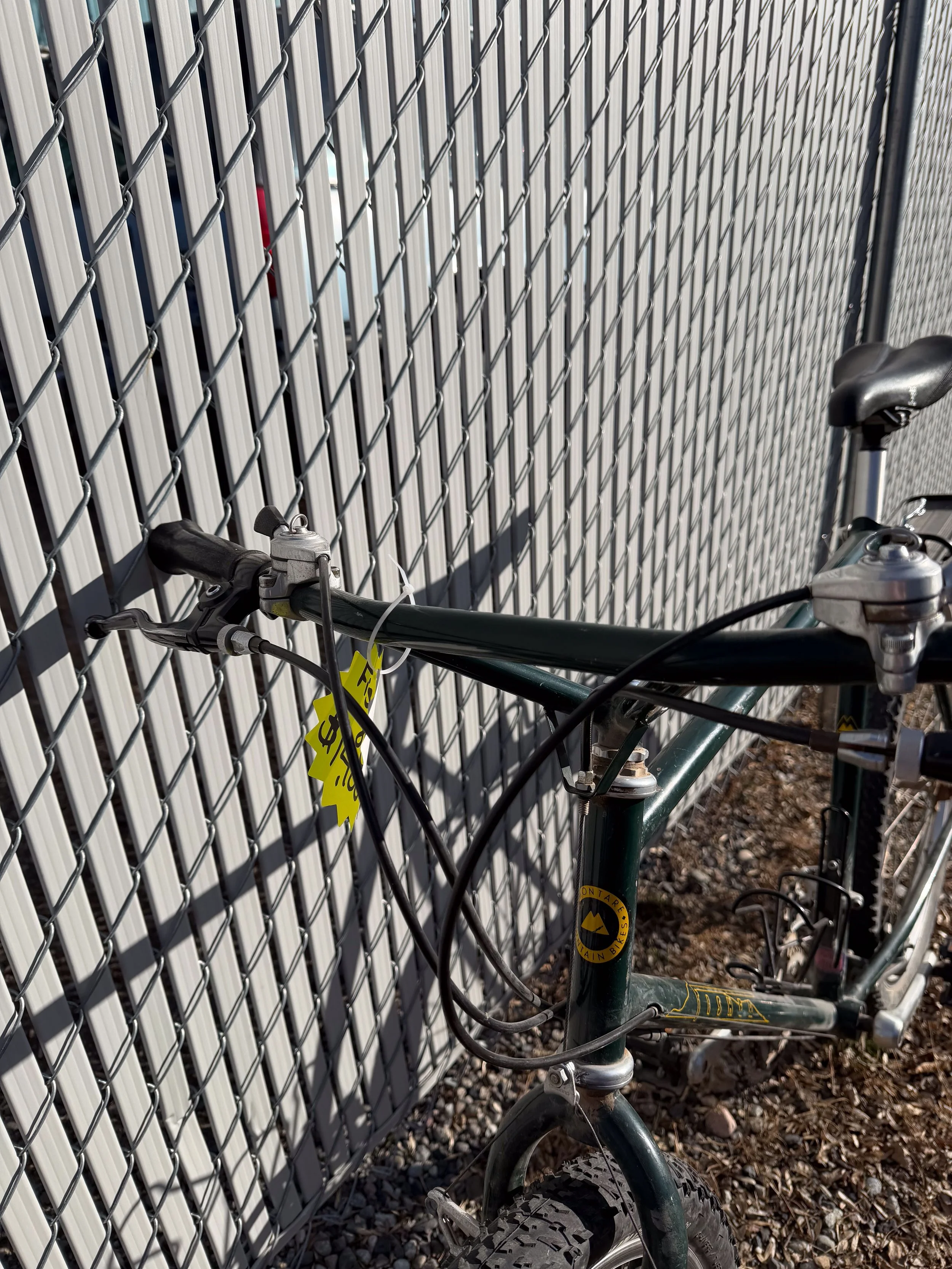 Photo of a 1985 vintage green Fisher mountain bike for sale.
