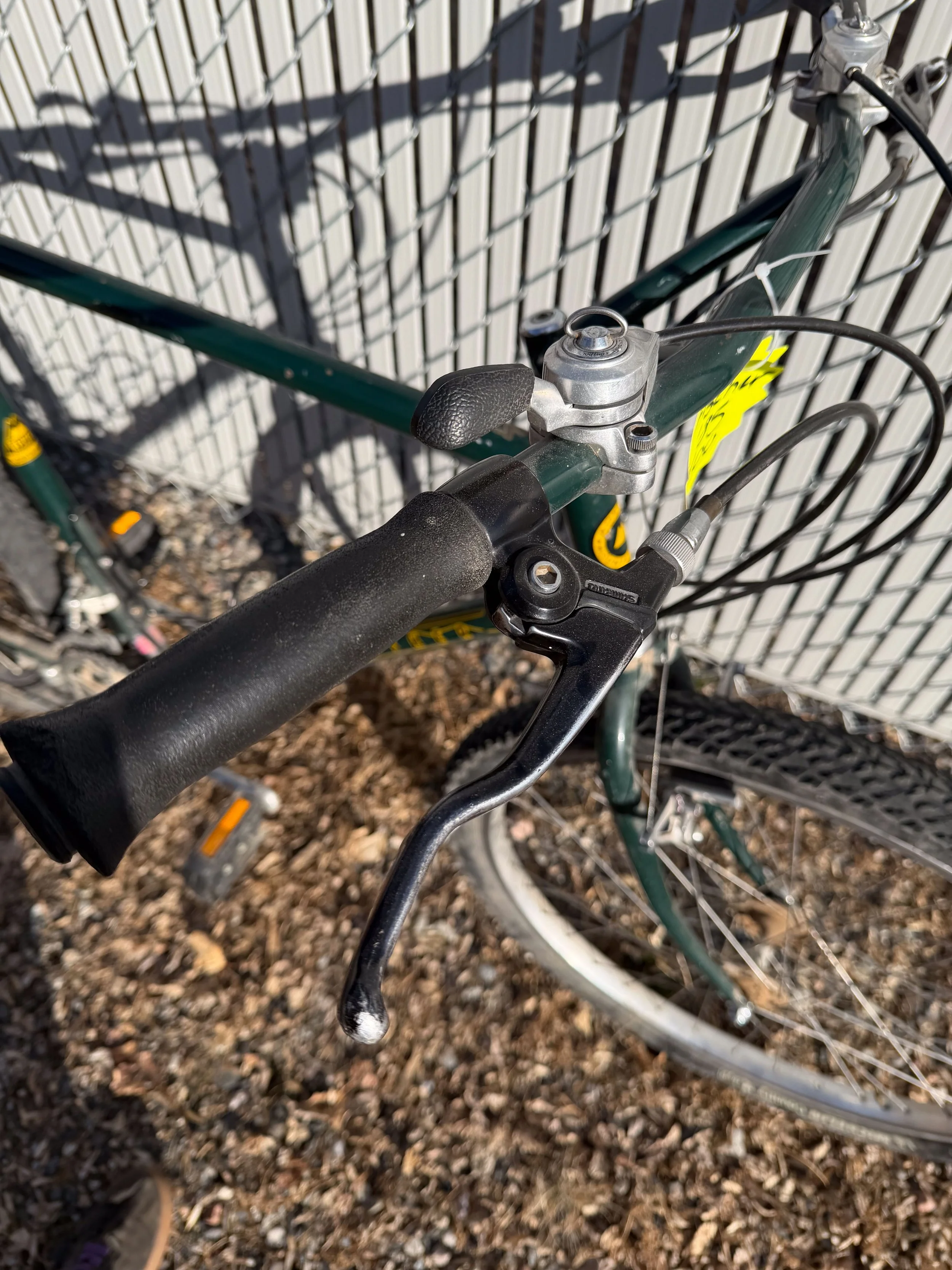 Photo of a 1985 vintage green Fisher mountain bike for sale.