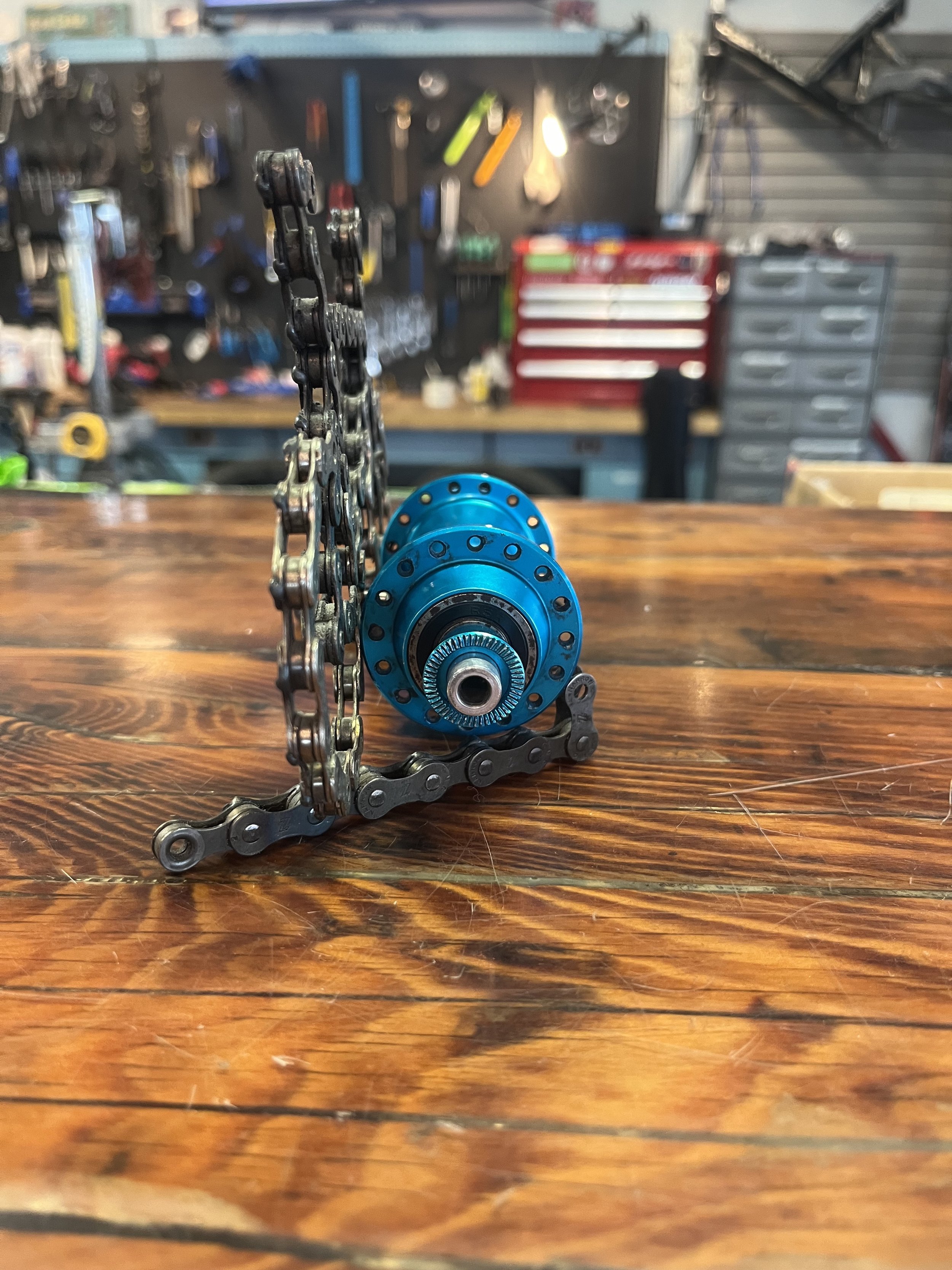 Photo of a turquoise Ringle rear freewheel hub fro sale.