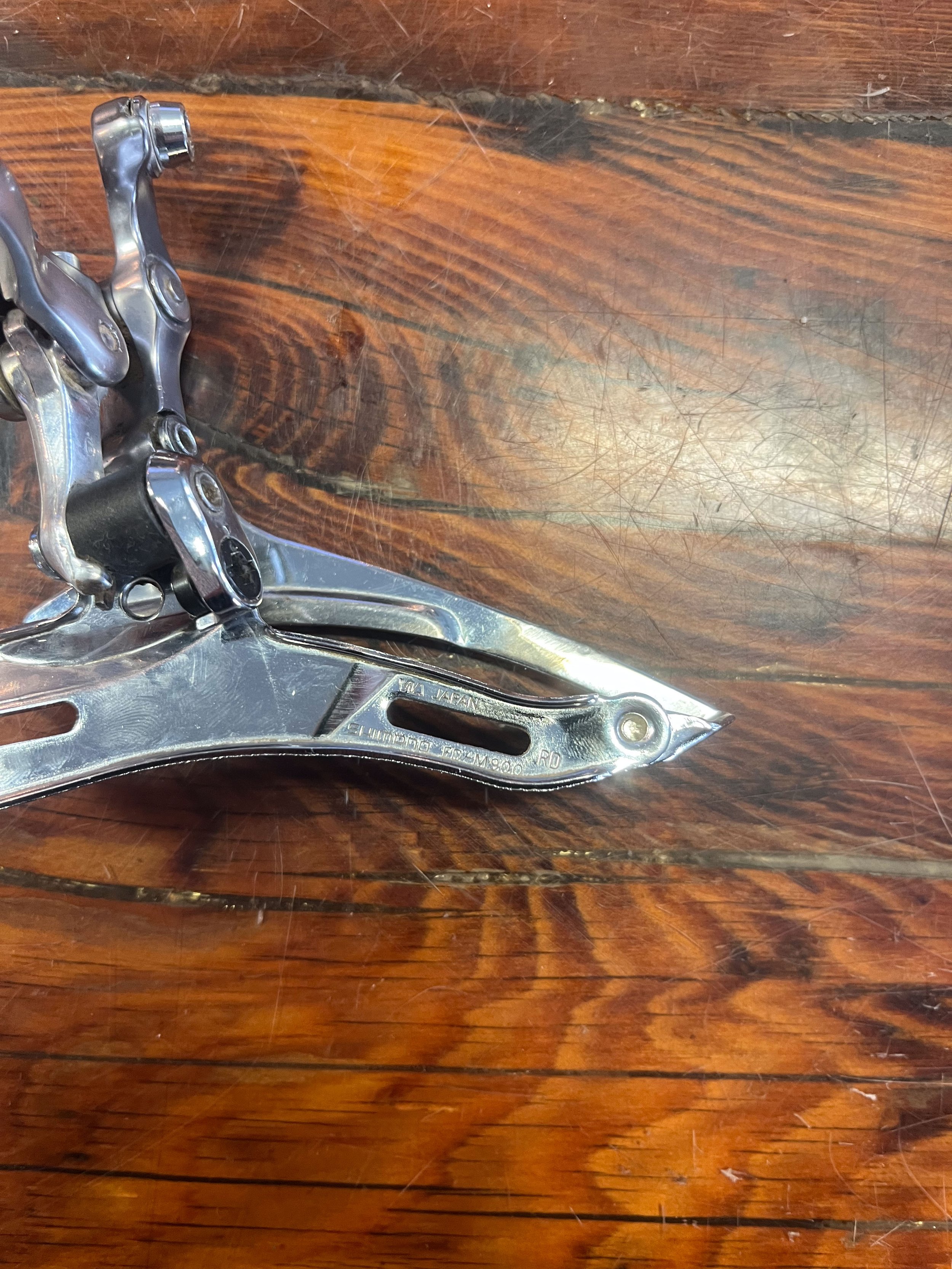 Photo showing the part number of FD-M900 on a Shimano XTR front derailleur for sale.