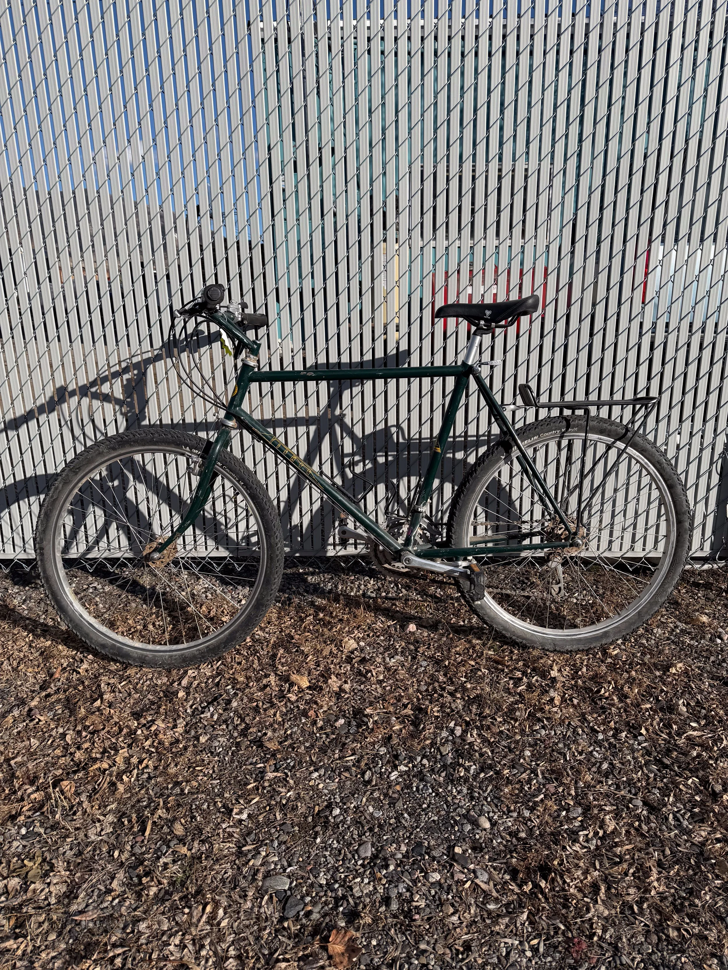 Photo of a 1985 vintage green Fisher mountain bike for sale.