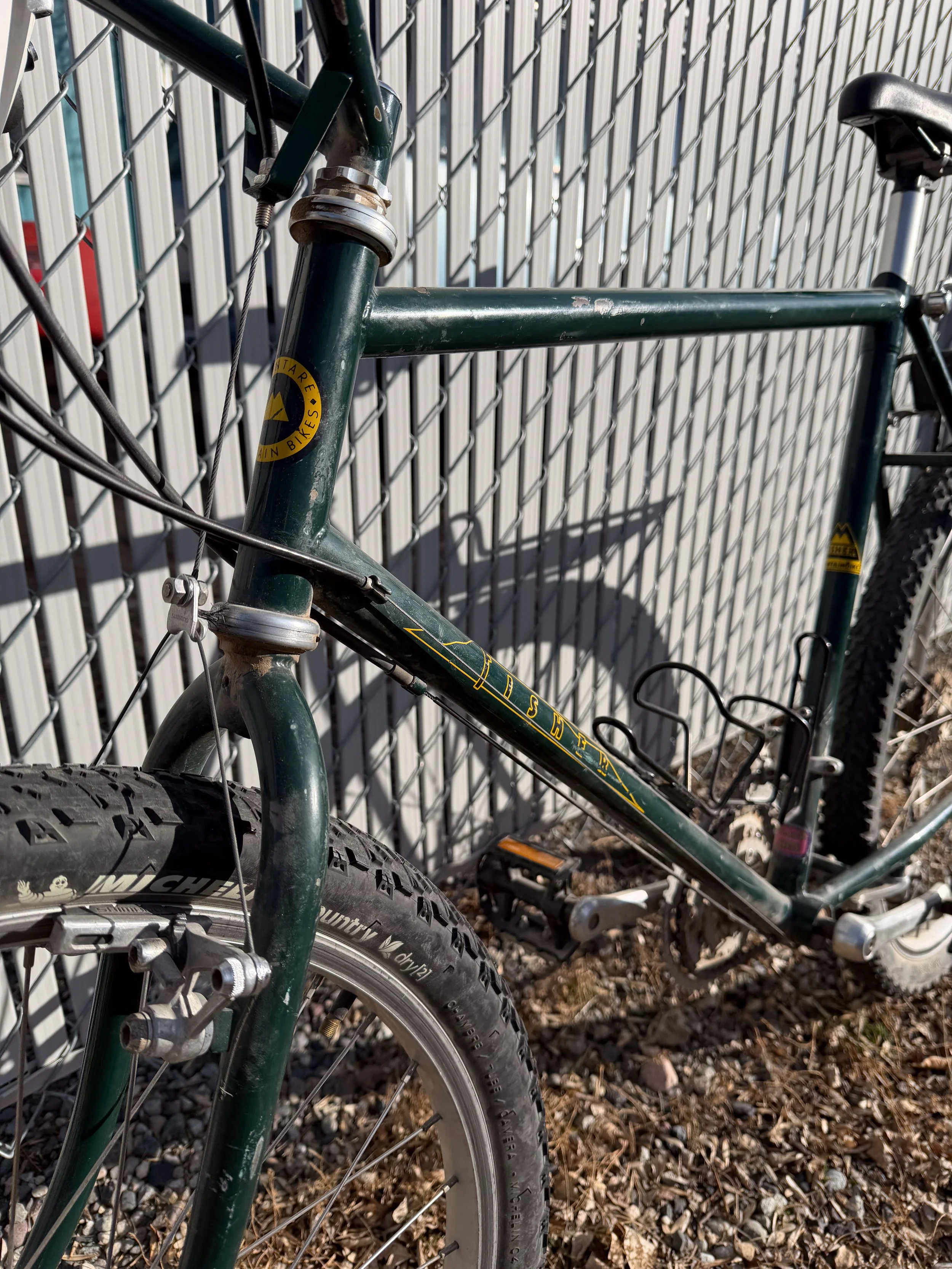 Photo of a 1985 vintage green Fisher mountain bike for sale.