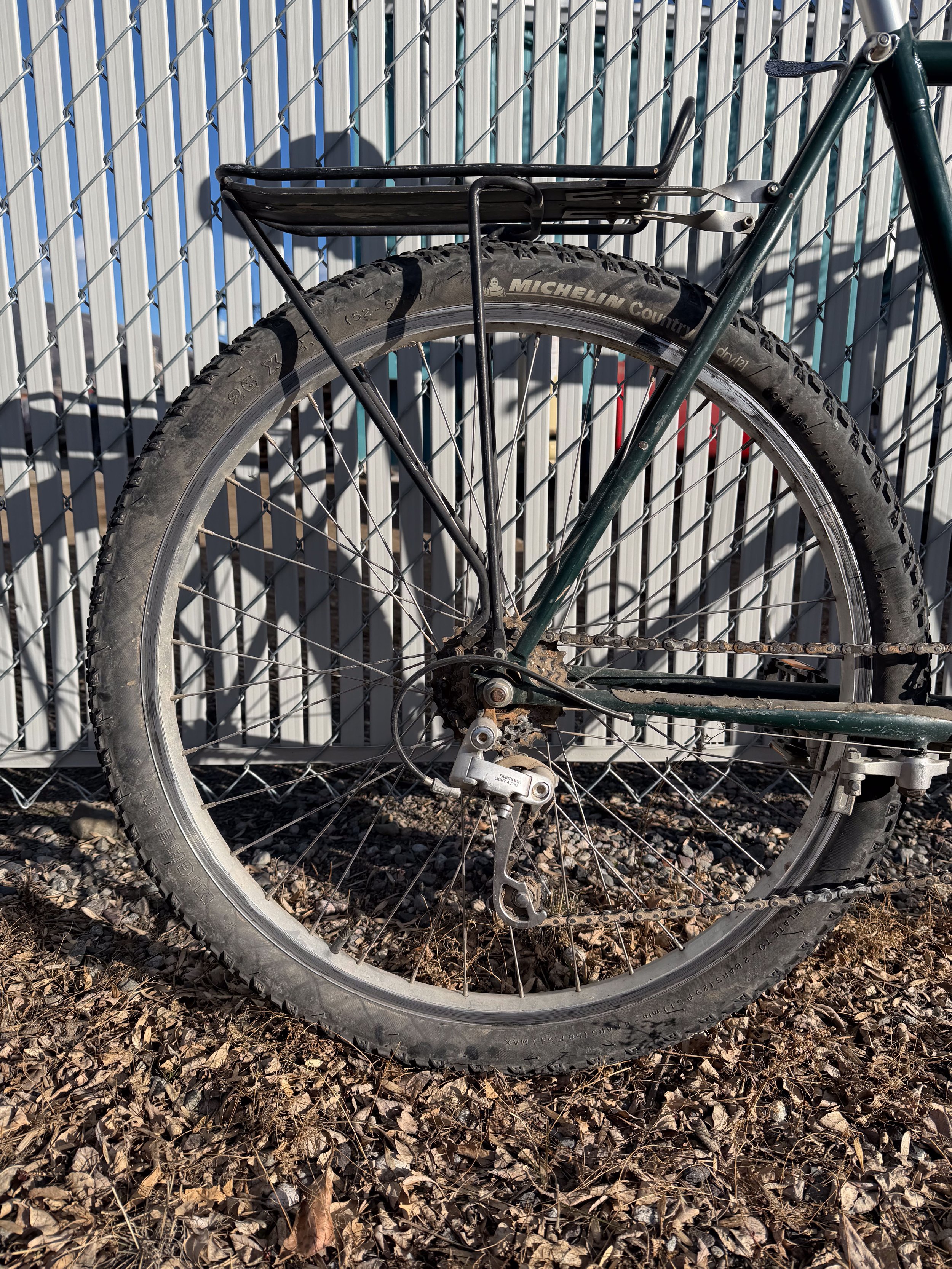 Photo of a 1985 vintage green Fisher mountain bike for sale.