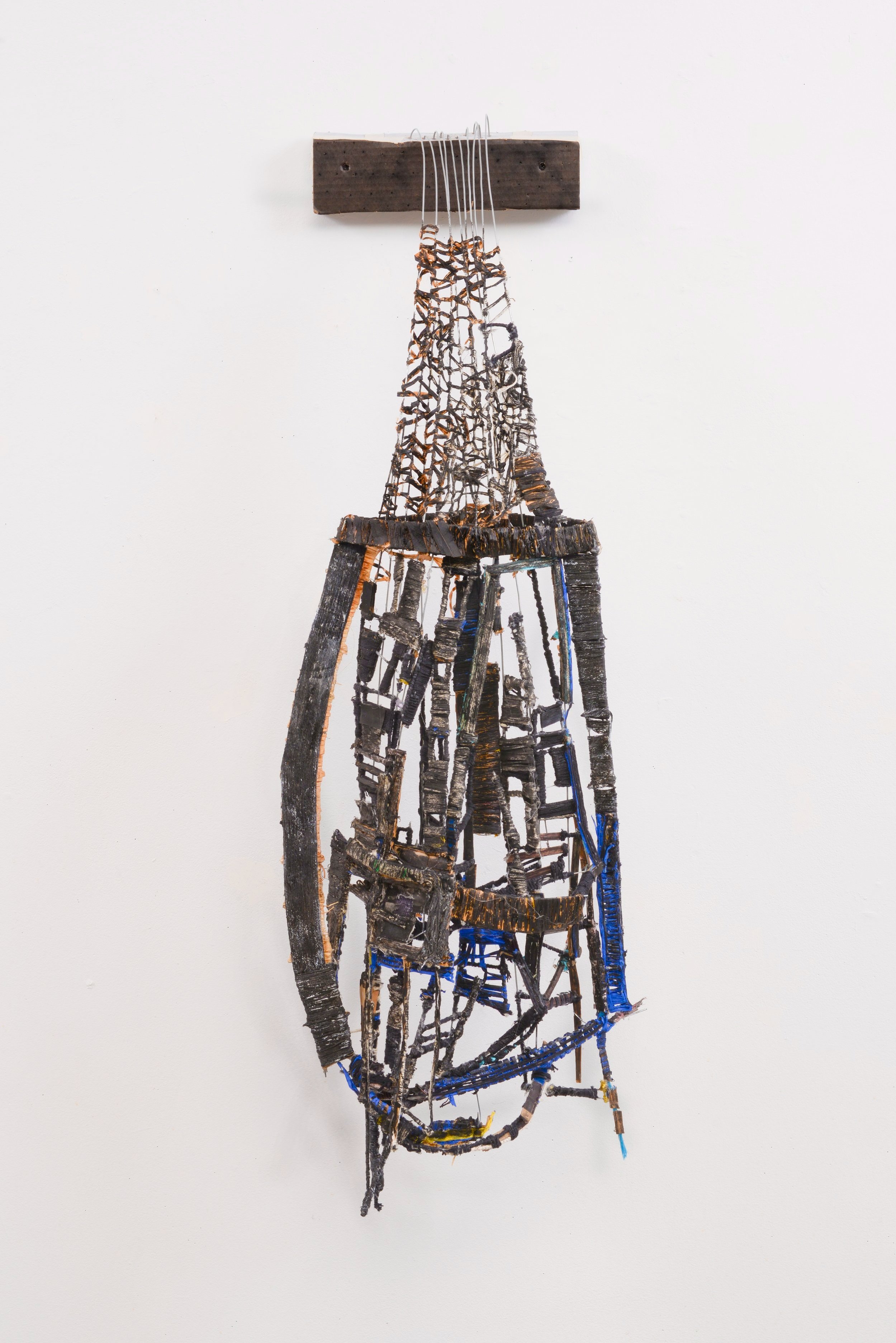   Mountain Logic , 2023   52” h x 15.5” w x 9” d  Raffia, string, paint, glue, wire       