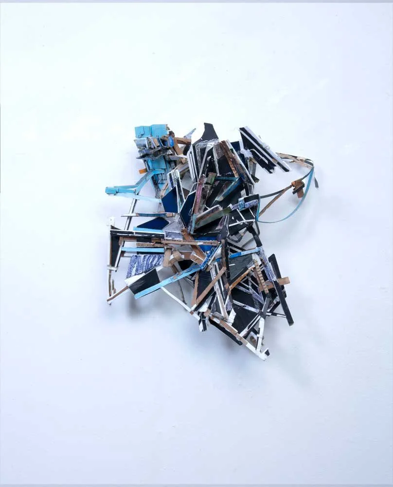   The Plan Undone , 2026  steel strapping, cardboard, board, paint 31” x 28” x 12” 