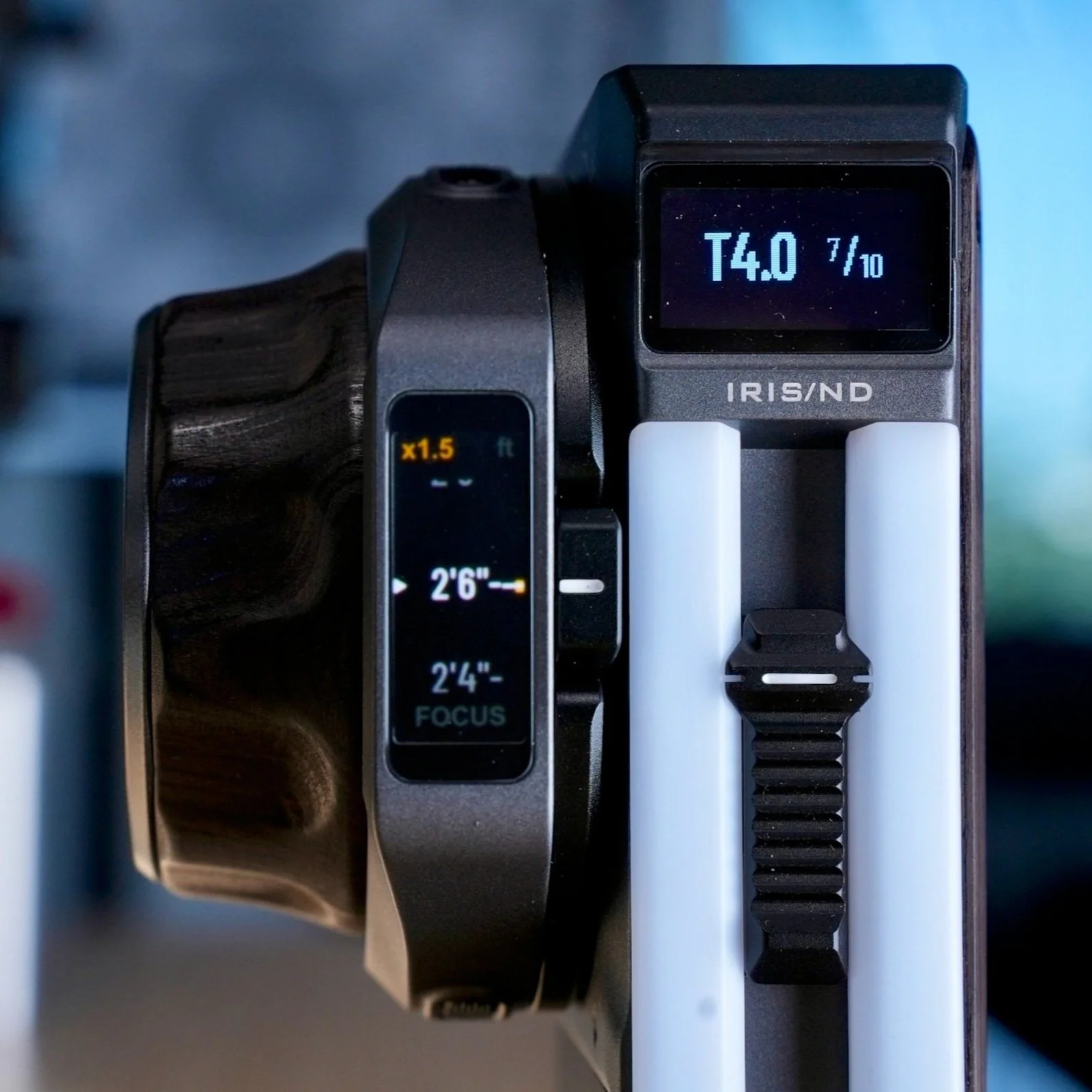 Close-up of a digital camera focusing screen showing aperture setting T4.0, shutter speed 1/10, and focus distance 2 feet 6 inches.