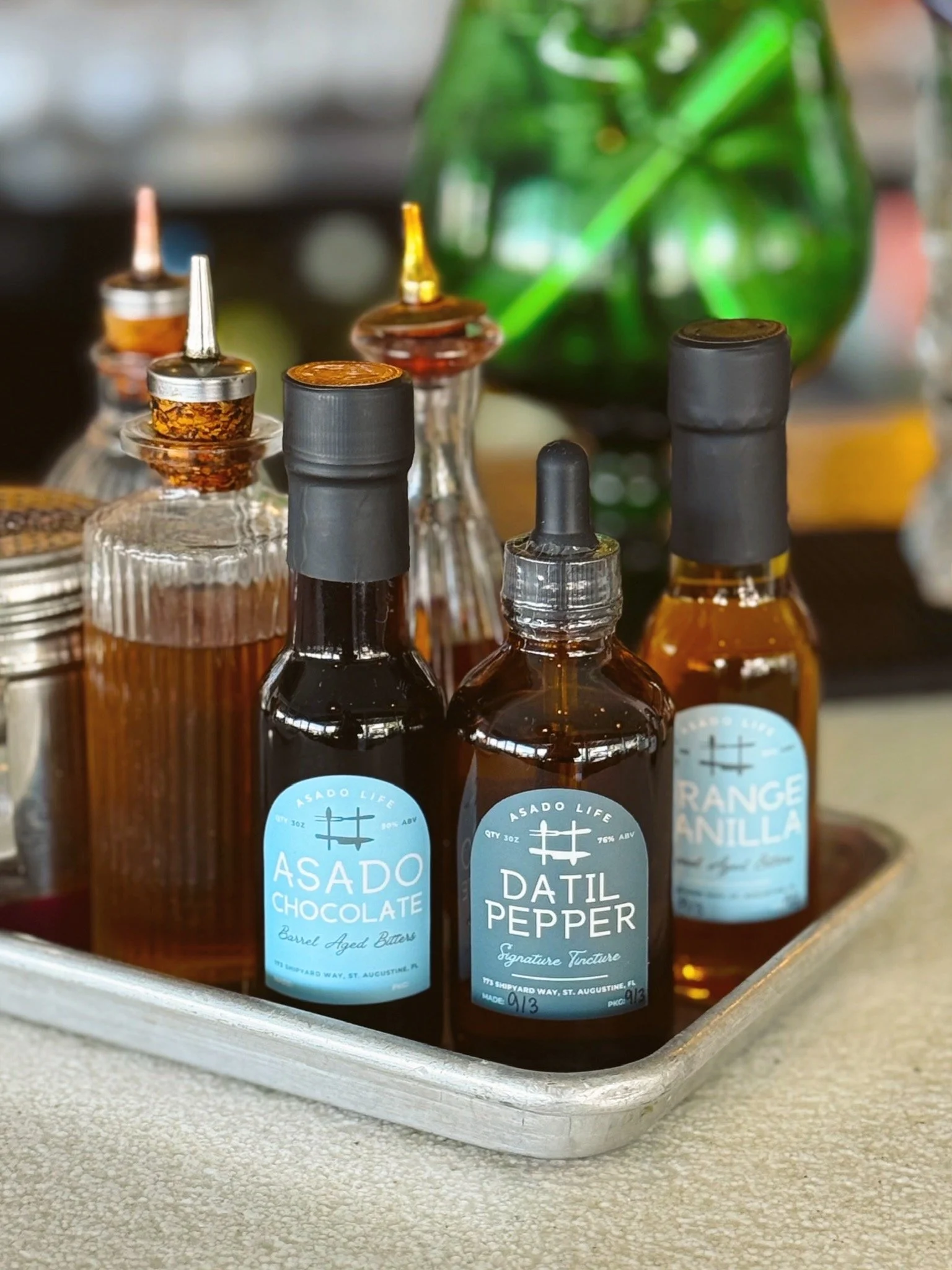 Asado Life’s housemade bitters and tinctures, crafted in-house to add depth, balance, and flavor to cocktails.