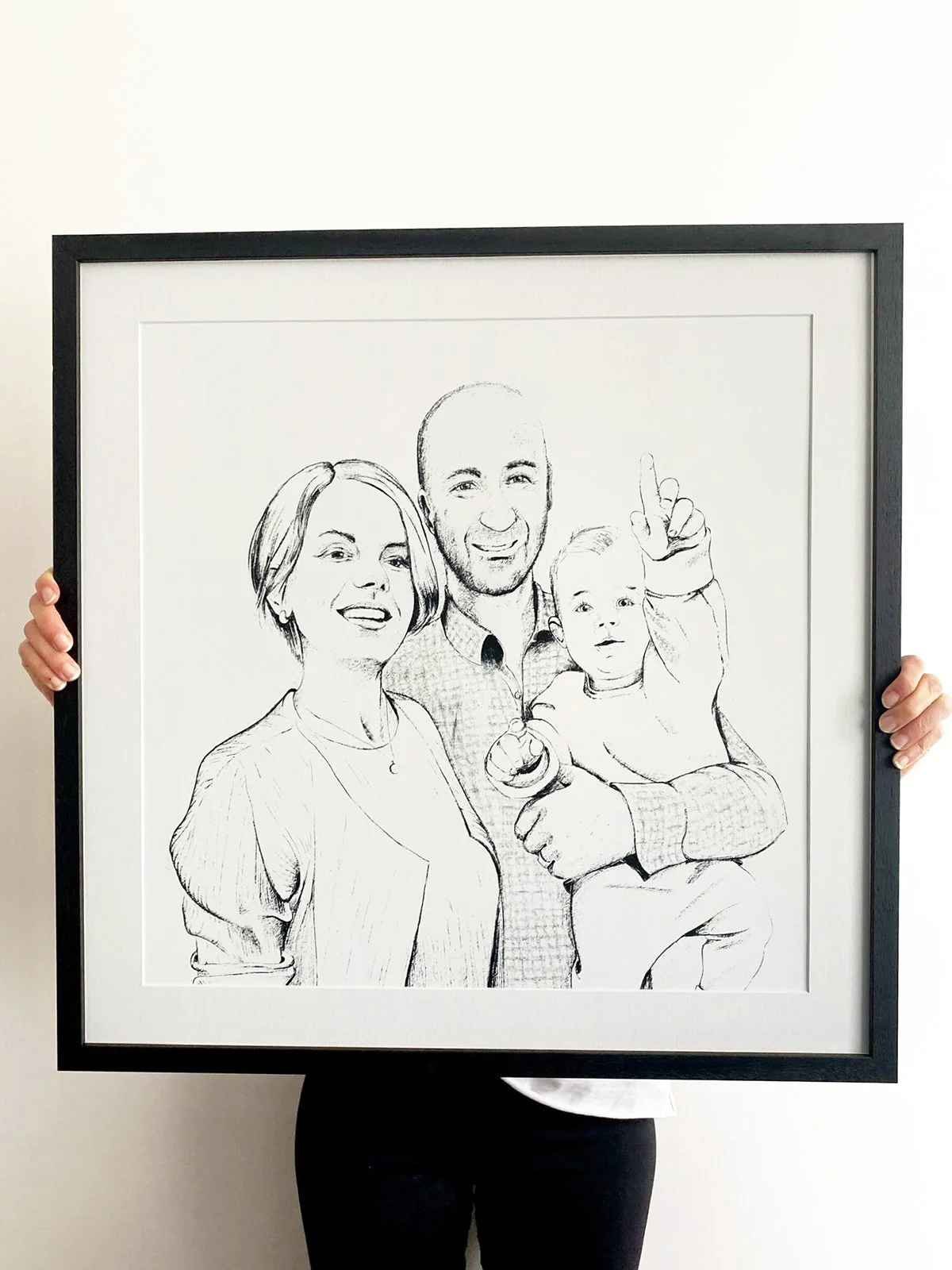 Portret in zwart-wit van koppel met kindje