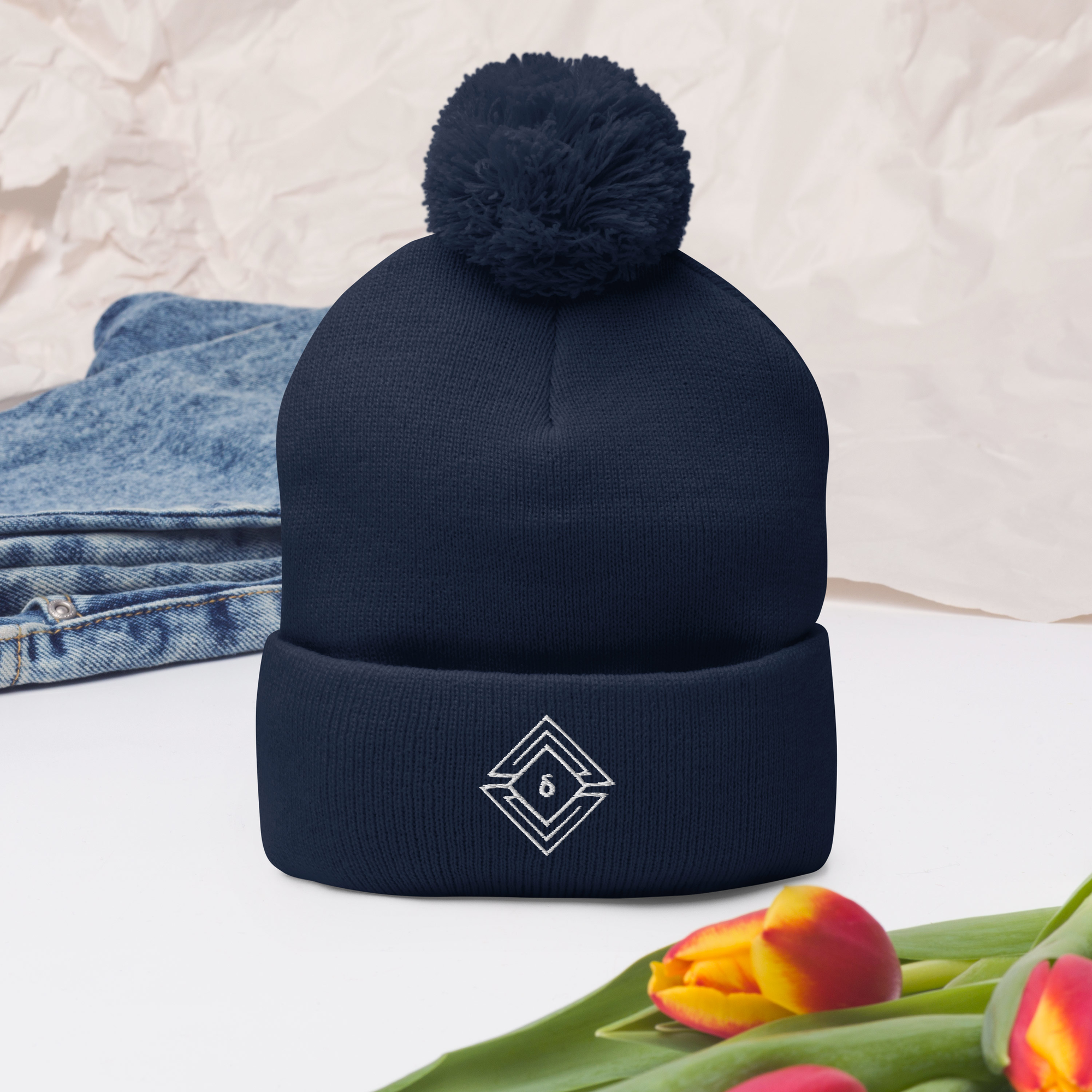 pom-pom-knit-cap-navy-front-2-63d82feddb8c0.png