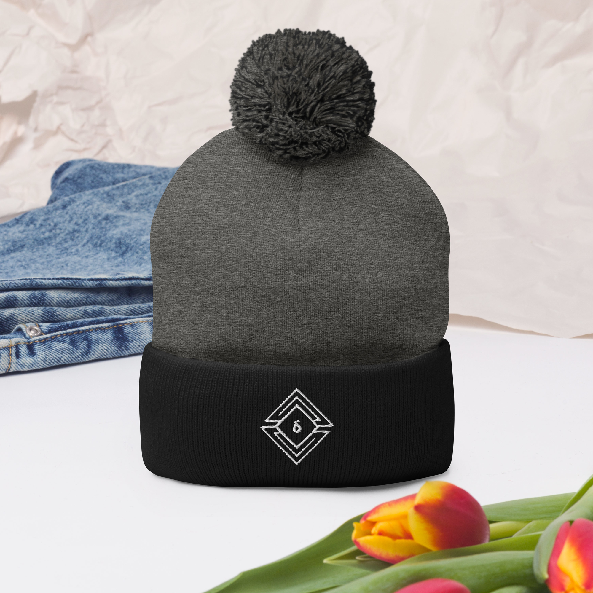 pom-pom-knit-cap-dark-heather-grey-black-front-2-63d82feddbbfb.png