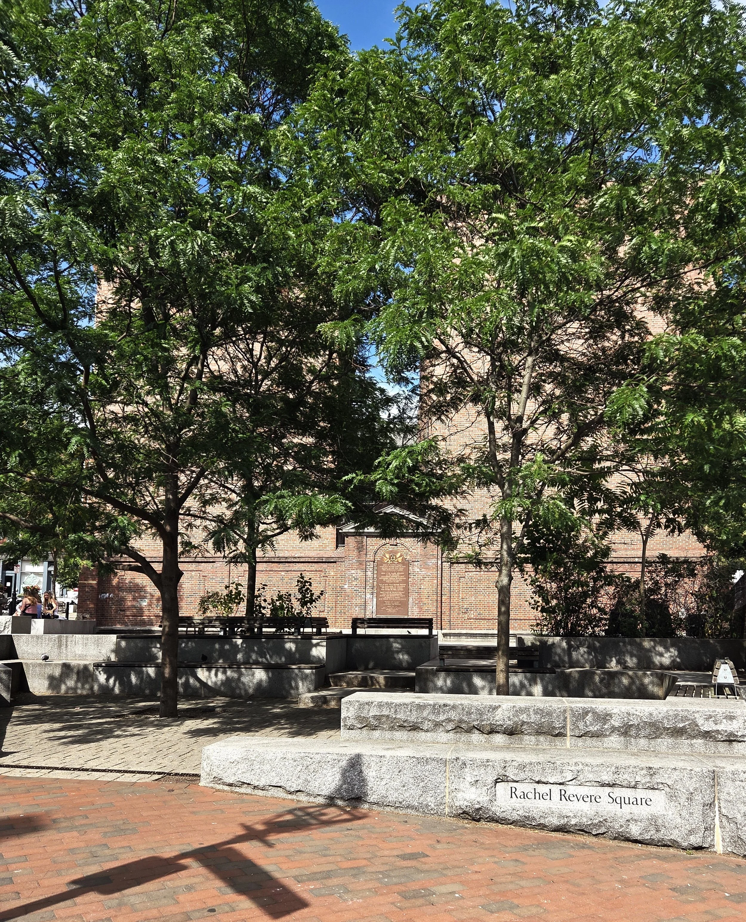 shaded stone benches