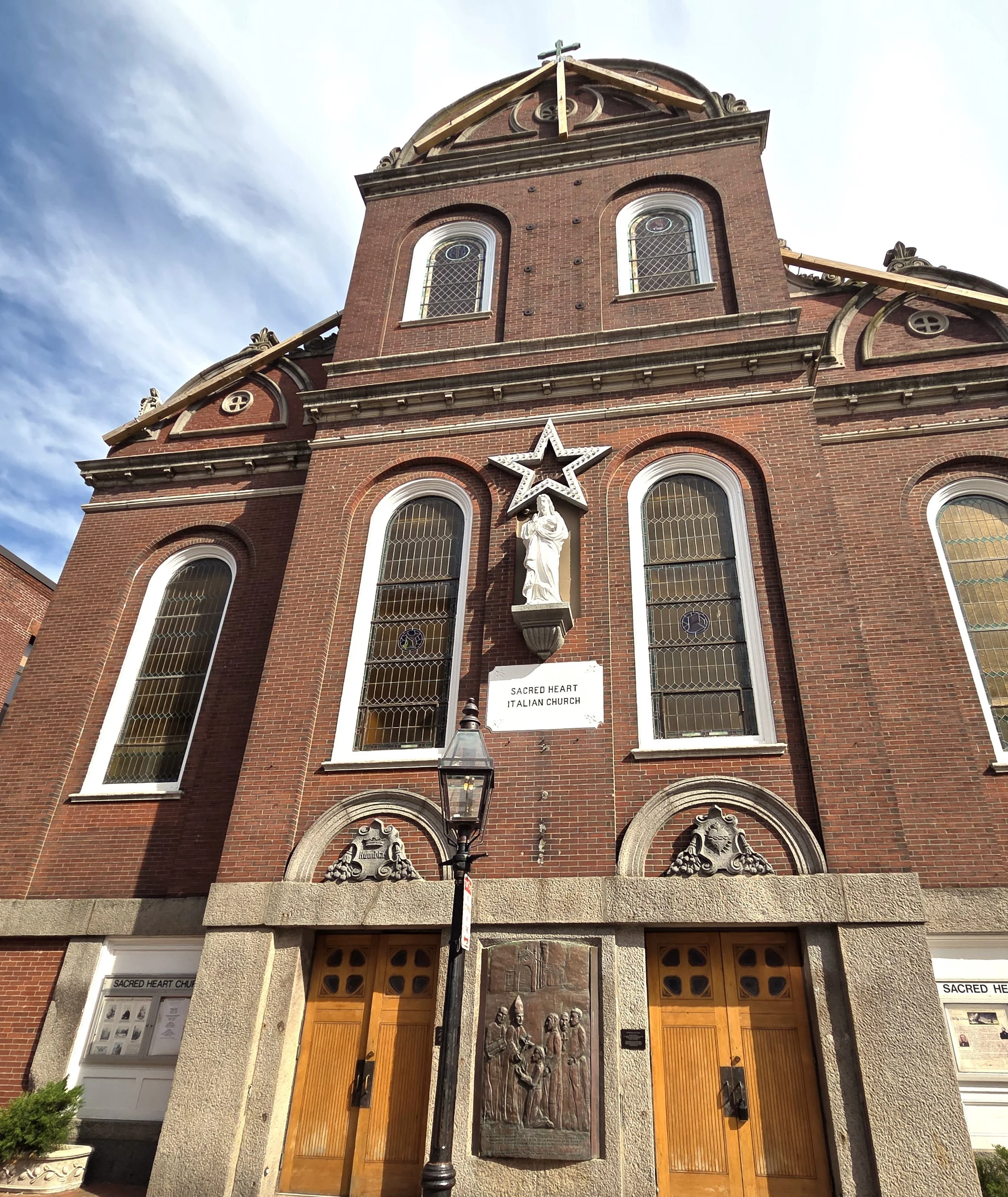 brick façade of the Sacred Heart Italian Church