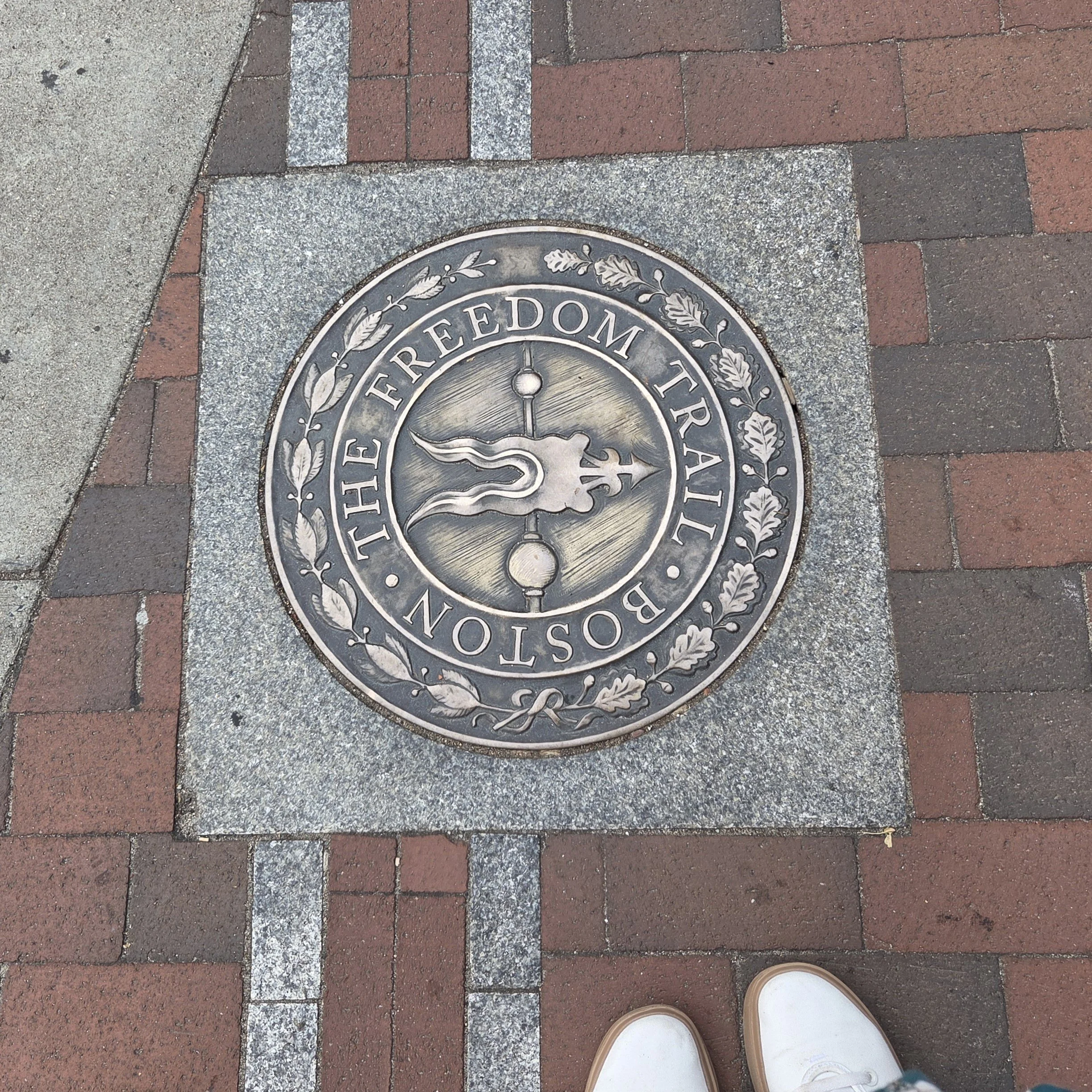 Embossed Freedom Trail Plaque in the ground