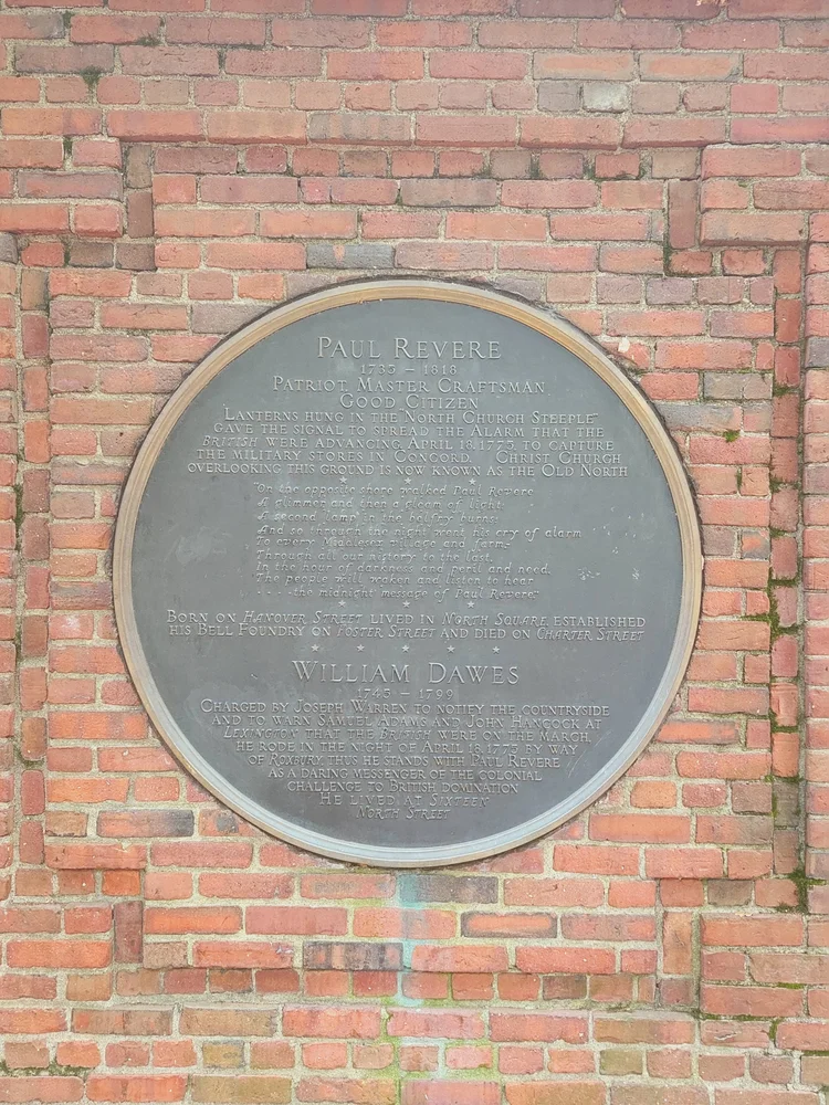 Bronze plaque on the Paul Revere Mall commemorating a historical figure