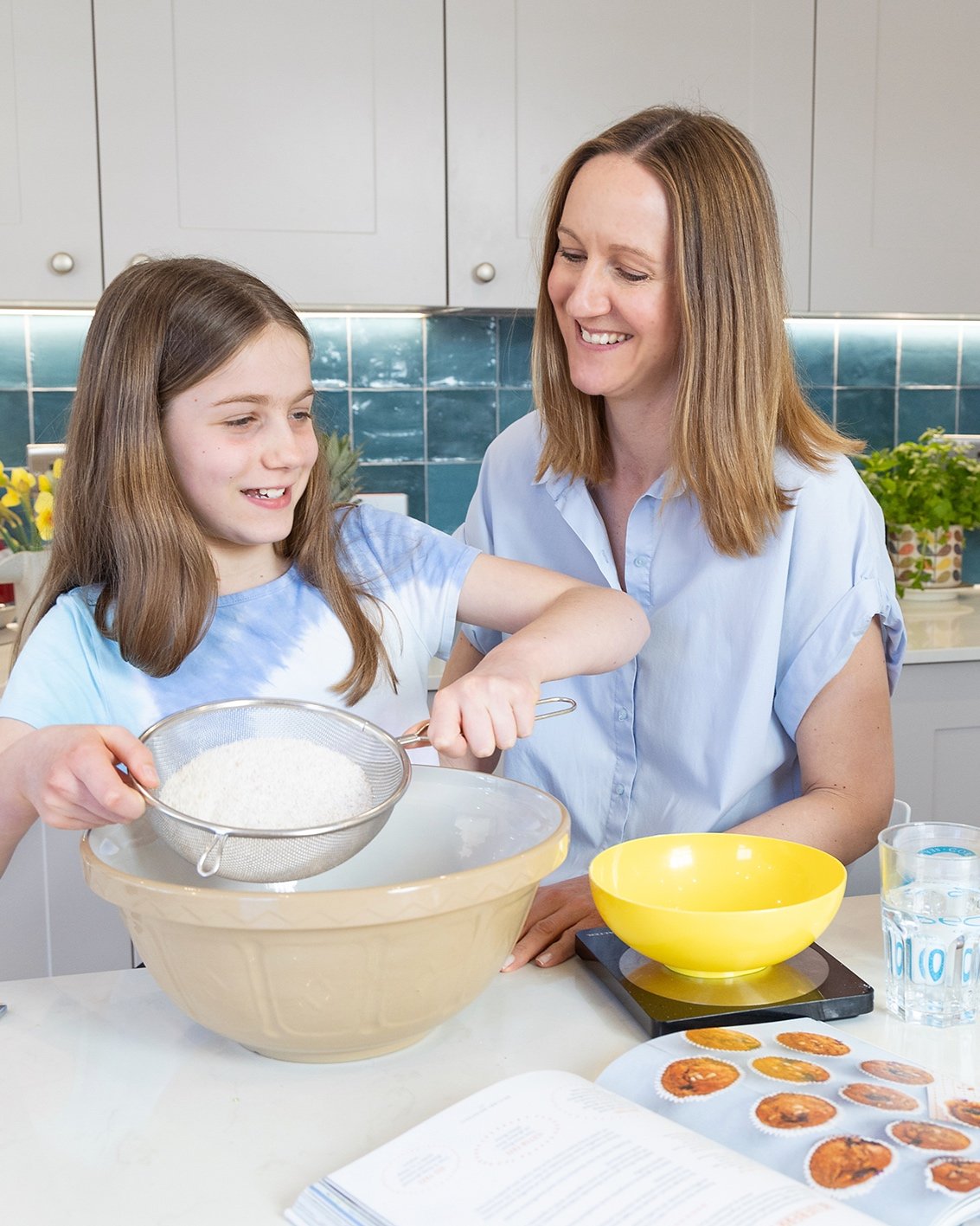 Emily Furniss with child baking
