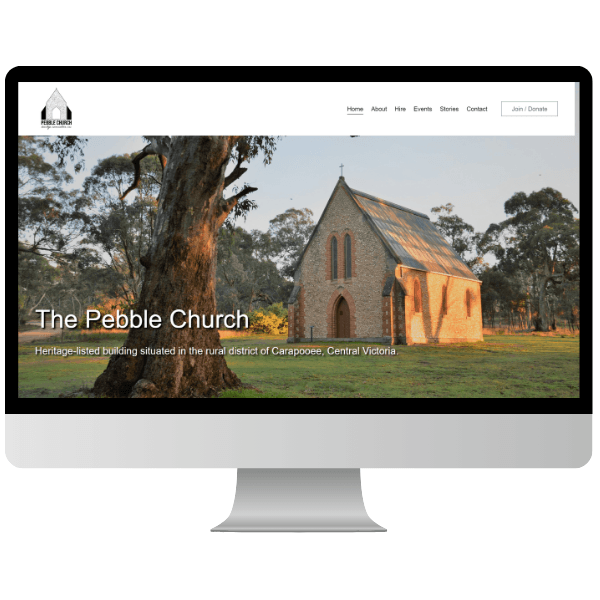 image of desktop computer with screenshot of The Pebble Church homepage