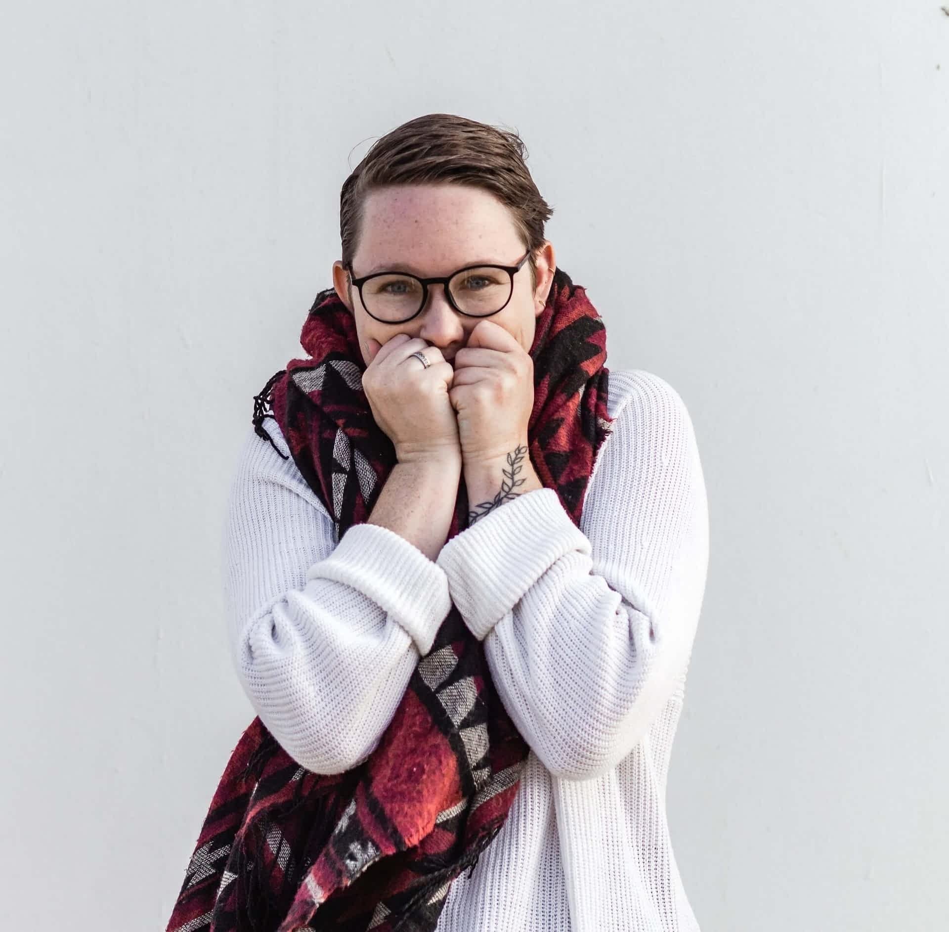 excited woman in jumper to demonstrate excited hot lizard design clients