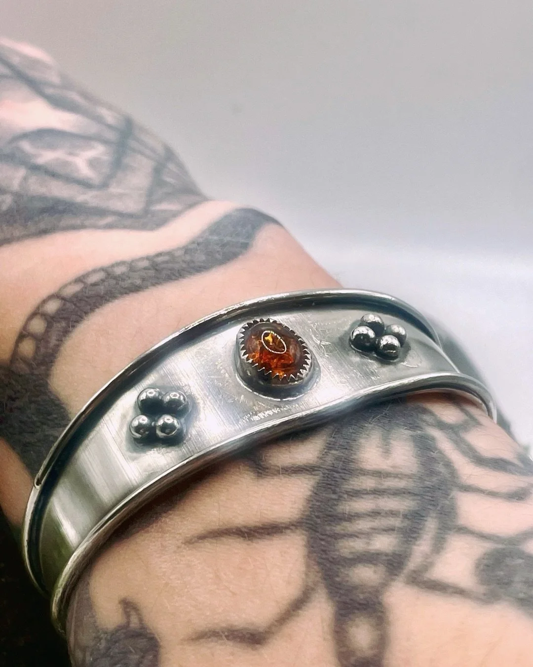 Medieval Devilry II is live! Head over to my site to see all the pieces. This is one of my favourites, the Holly II cuff is a made with armour in mind. It features a glowing Baltic amber stones and medieval flower motifs. Heavy metal meets olde Albio